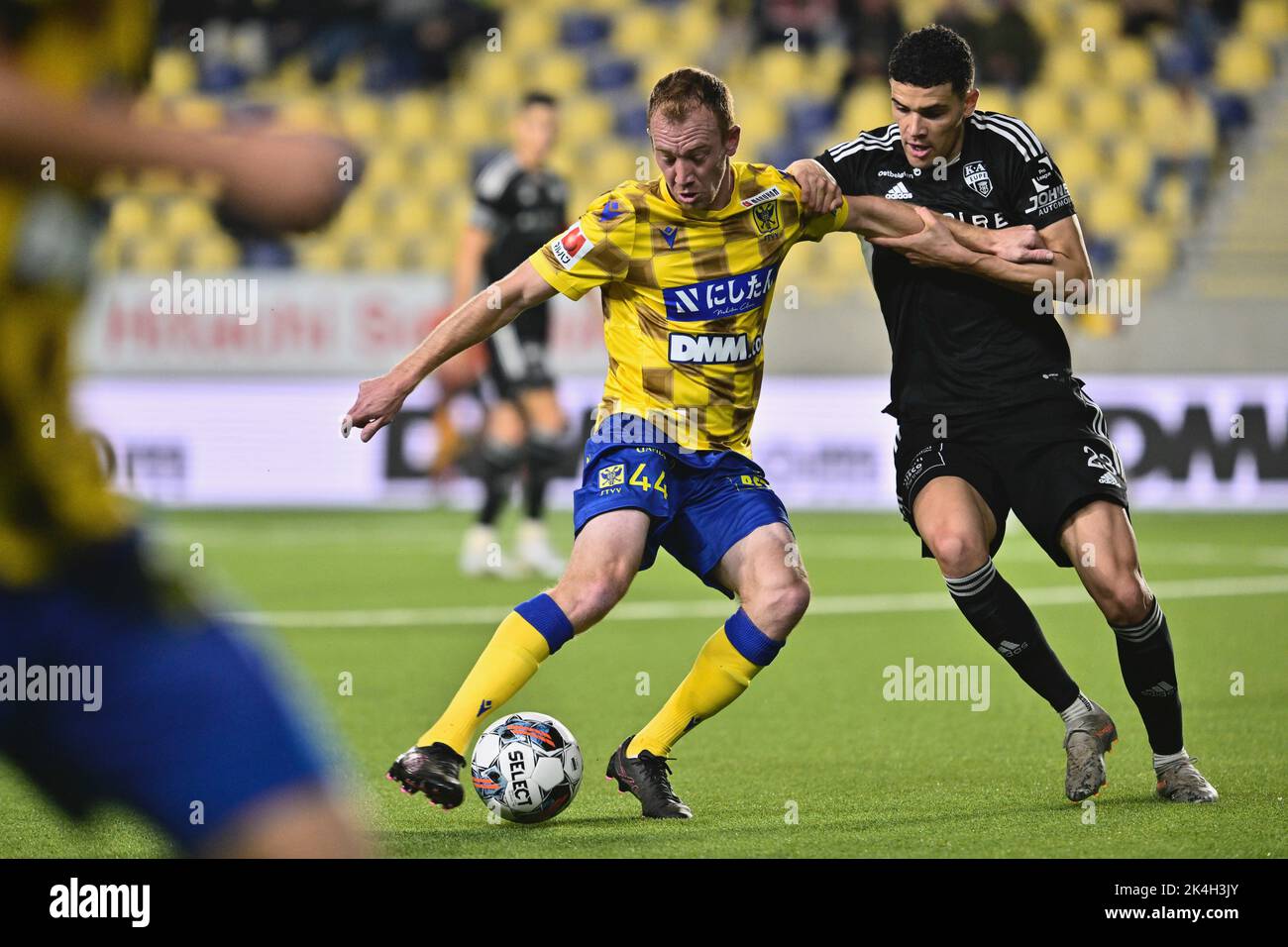STVV's Christian Bruls and Eupen's Isaac Christie-Davies fight for the ball during a soccer match between Sint-Truidense VV and KAS Eupen, Sunday 02 October 2022 in Sint-Truiden, on day 10 of the 2022-2023 'Jupiler Pro League' first division of the Belgian championship. BELGA PHOTO JOHAN EYCKENS Stock Photo