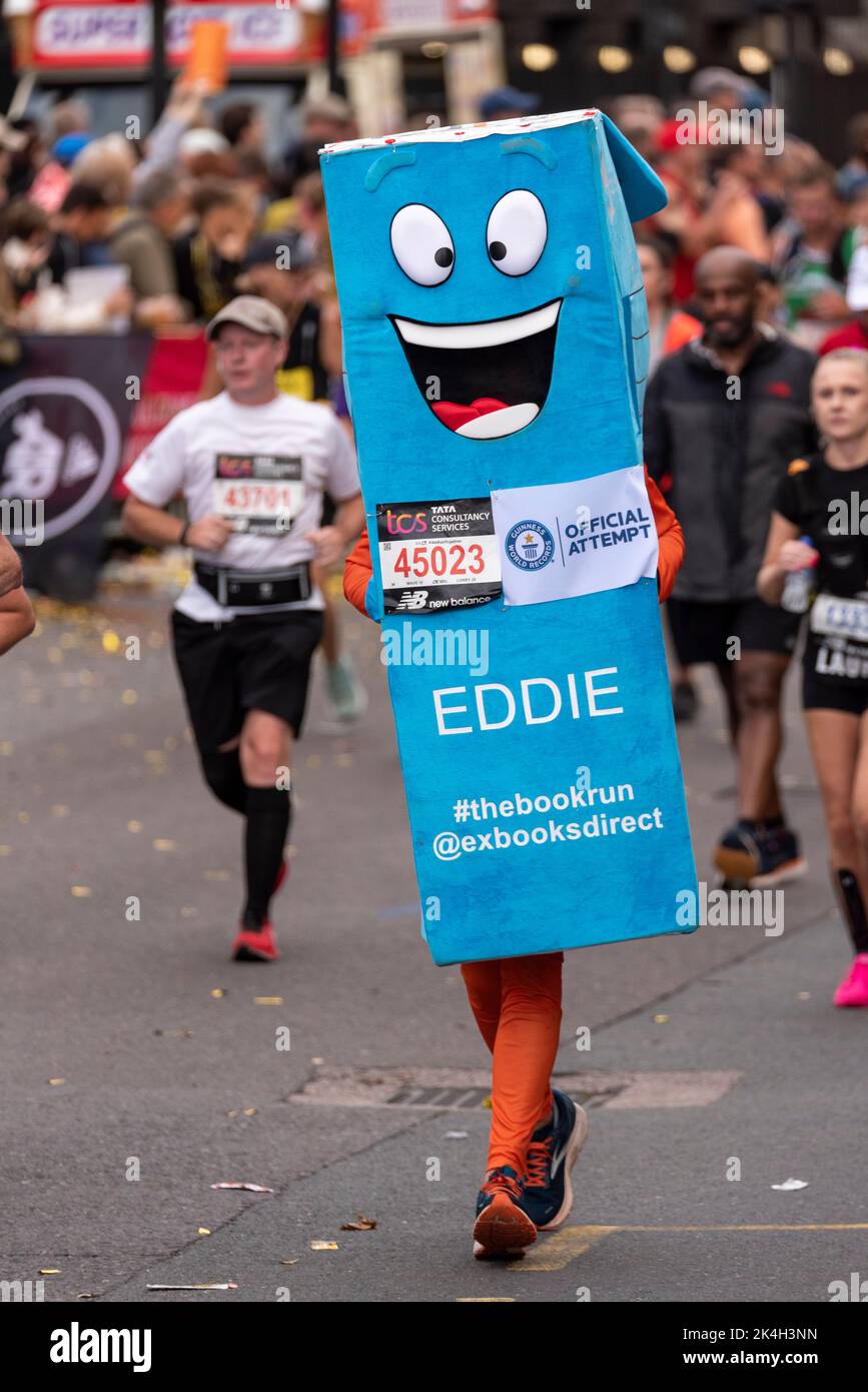 Philip Beer running in the TCS London Marathon 2022, on Tower Hill road