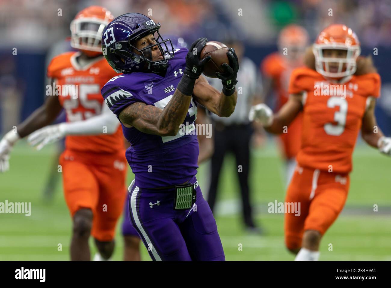 Stephen F. Austin Lumberjacks wide receiver Darryle Simmons (23) makes a catch for a touchdown against the Sam Houston State Bearkats, Saturday, Oct. Stock Photo