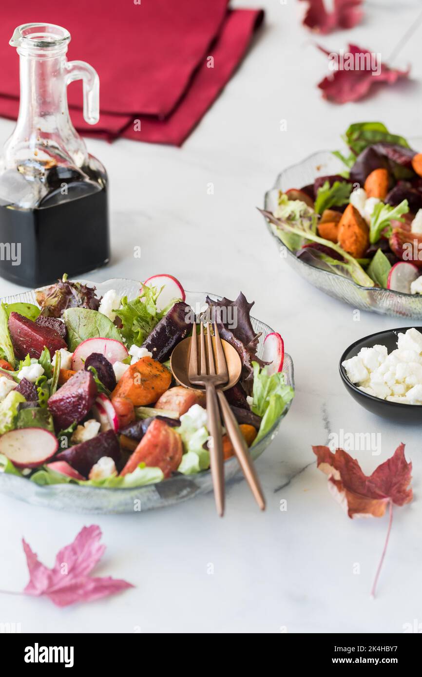 Roasted beet and carrot salad served with feta and balsamic dressing