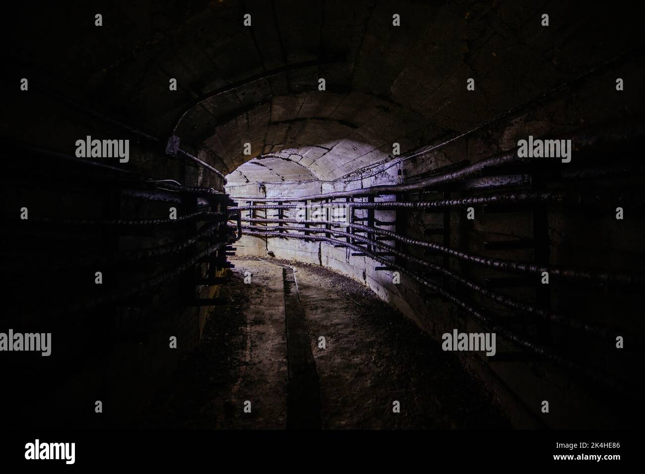 Electrical cables in underground technical tunnel Stock Photo Alamy