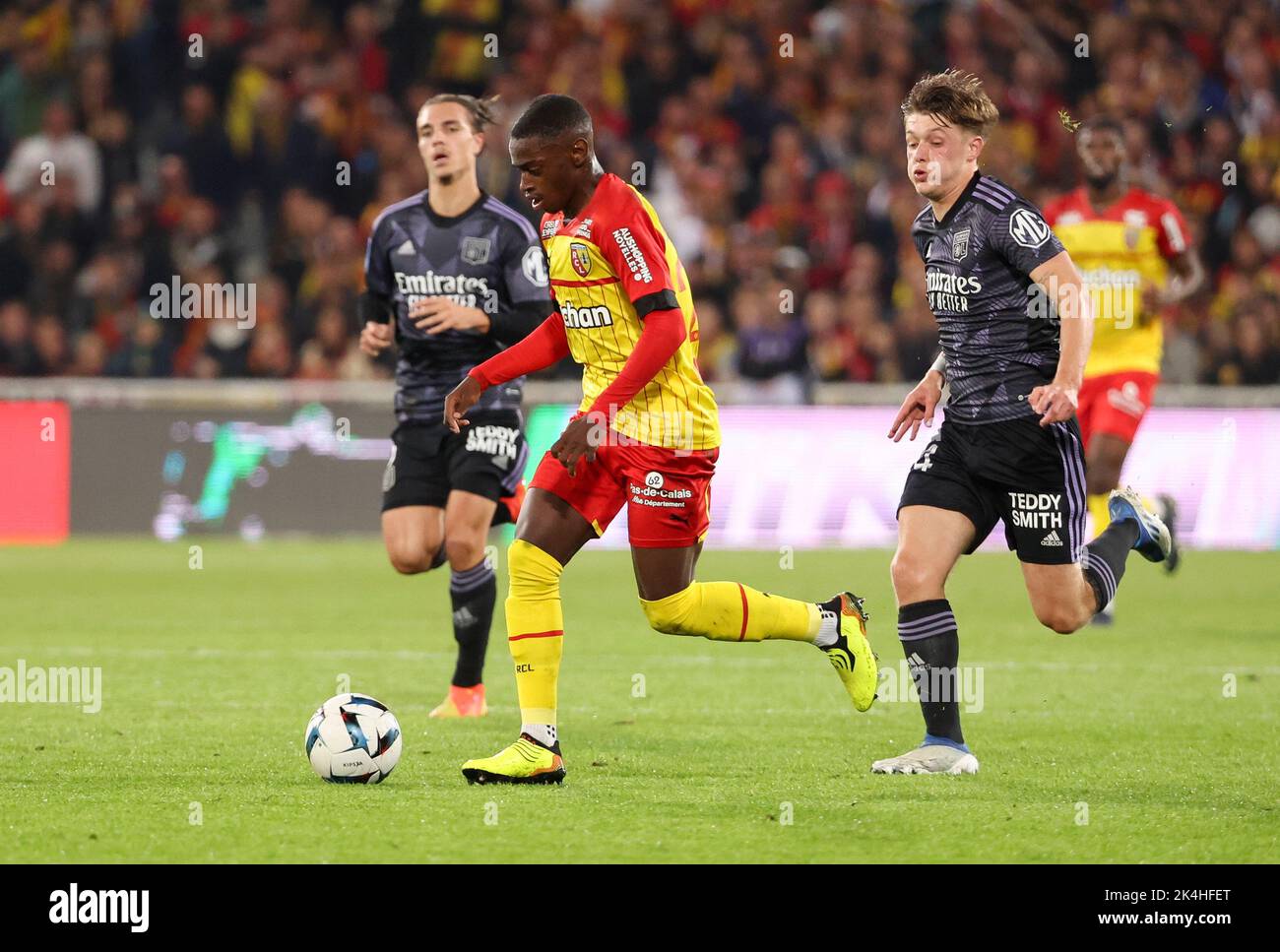 David Pereira Da Costa of Lens, Johann Lepenant of Lyon during the French championship Ligue 1 football match between RC Lens (RCL) and Olympique Lyonnais (OL, Lyon) on October 2, 2022 at Stade Bollaert-Delelis in Lens, France - Photo Jean Catuffe / DPPI Stock Photo