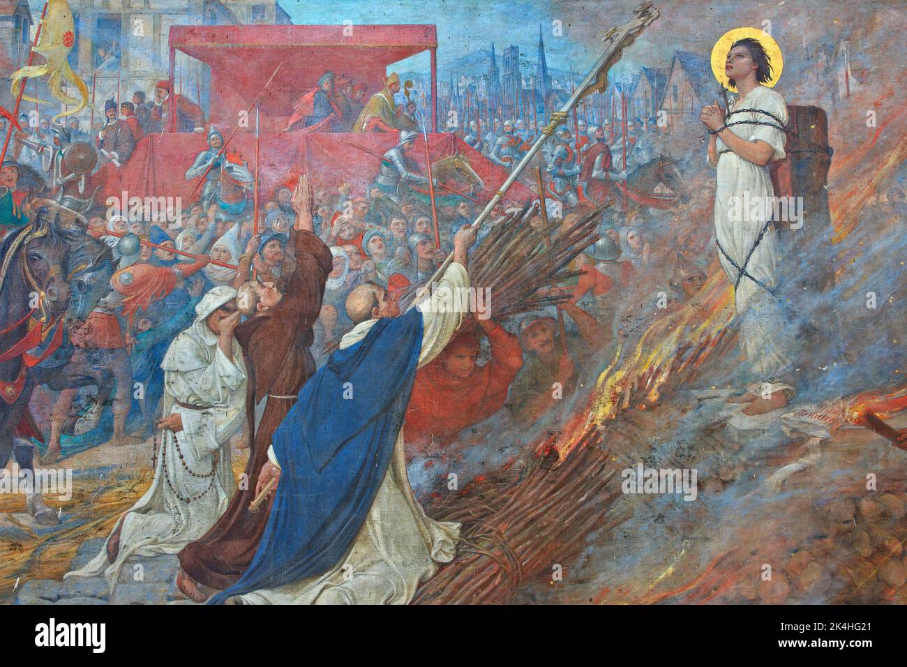 Joan of Arc (1412-1431) burning at the stake in Rouen on a mural painting at the basilica of Bois-Chenu in Domrémy-la-Pucelle (Vosges), France Stock Photo