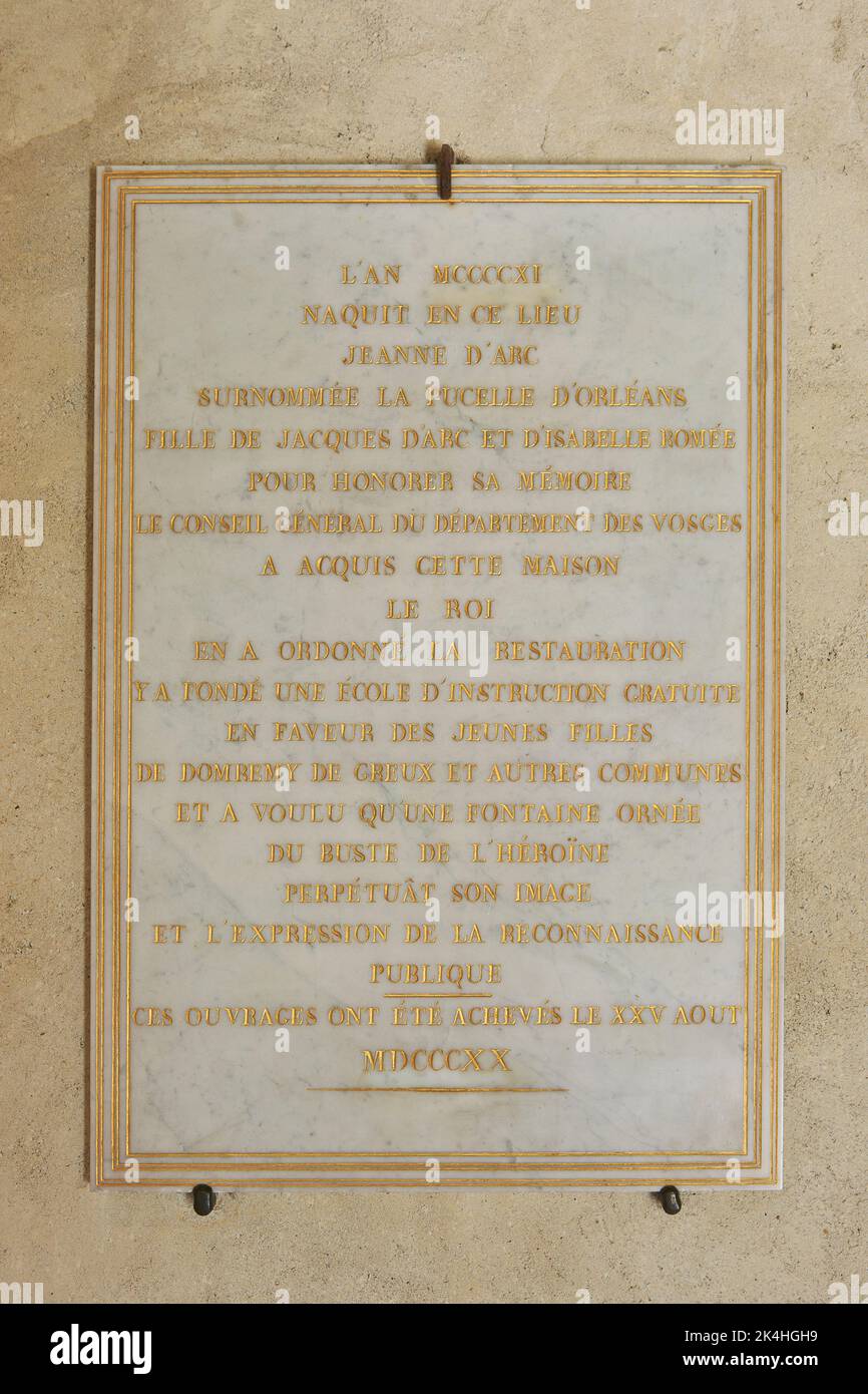 Commemorative plaque at the birthplace of Joan of Arc (1412-1431) in Domrémy-la-Pucelle (Vosges), France Stock Photo