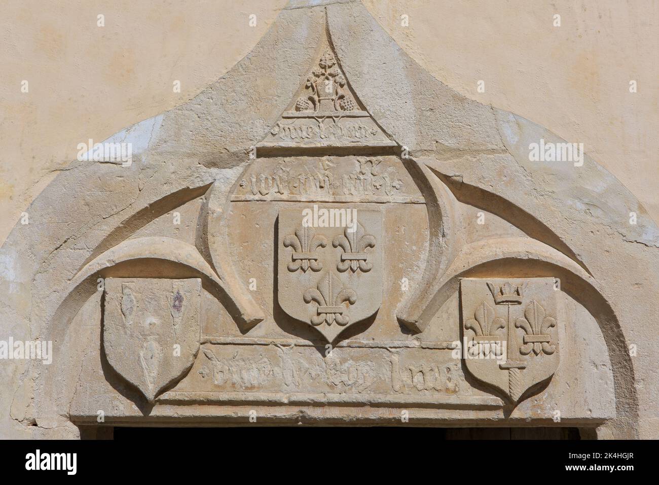 The family crest (coat of arms) above the entrance door of the birthplace of Joan of Arc (1412-1431) in Domrémy-la-Pucelle (Vosges), France Stock Photo