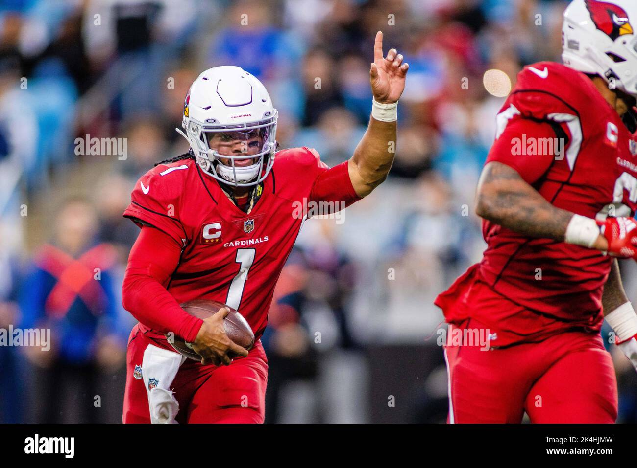 Charlotte, NC, USA. 2nd Oct, 2022. Arizona Cardinals quarterback Kyler Murray (1) celebrates his touchdown before he makes it to the end zone against the Carolina Panthers in the fourth quarter of the NFL matchup at Bank of America Stadium in Charlotte, NC. (Scott Kinser/Cal Sport Media). Credit: csm/Alamy Live News Stock Photo