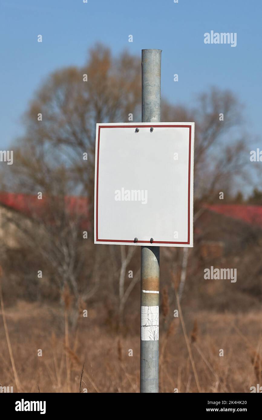 Empty sign on a land Stock Photo - Alamy
