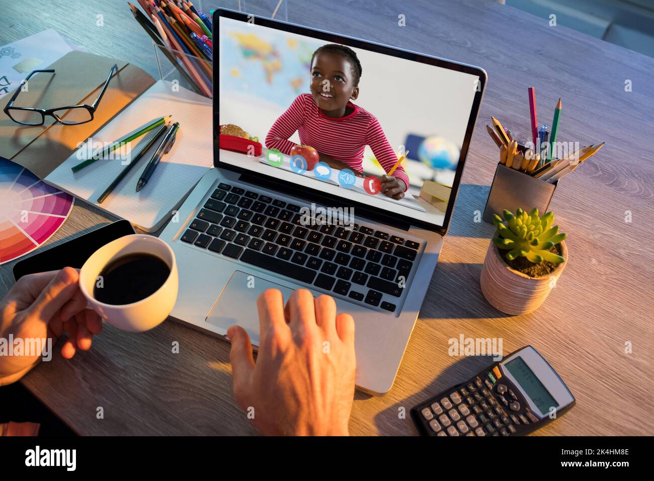 African american schoolgirl learning displayed on laptop screen during ...