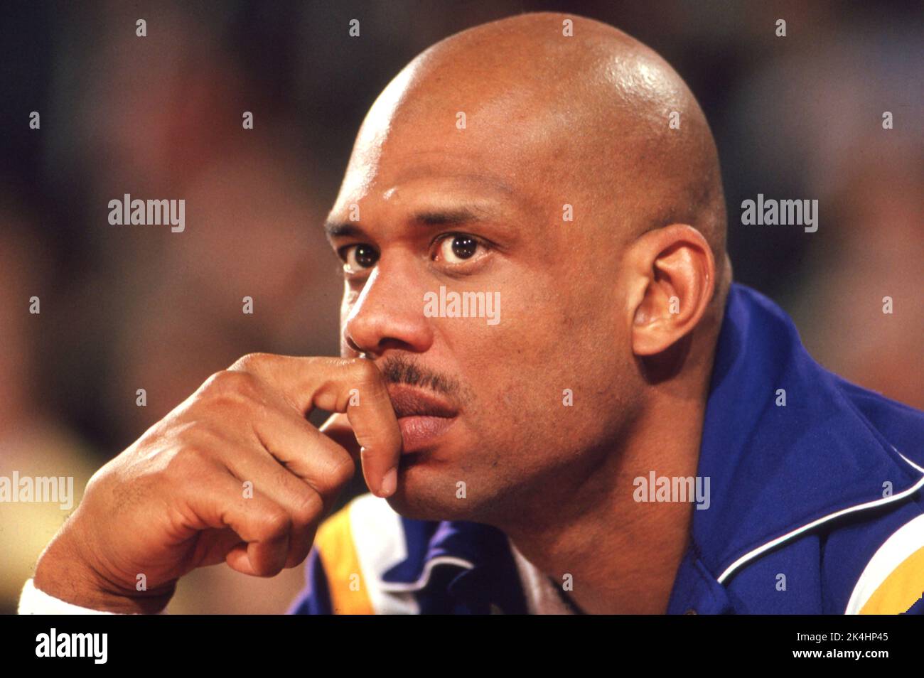 NBA superstar Kareem Abdul-Jabbar is shown on the bench during the waning years of his career with the Los Angeles Lakers in 1988. Stock Photo