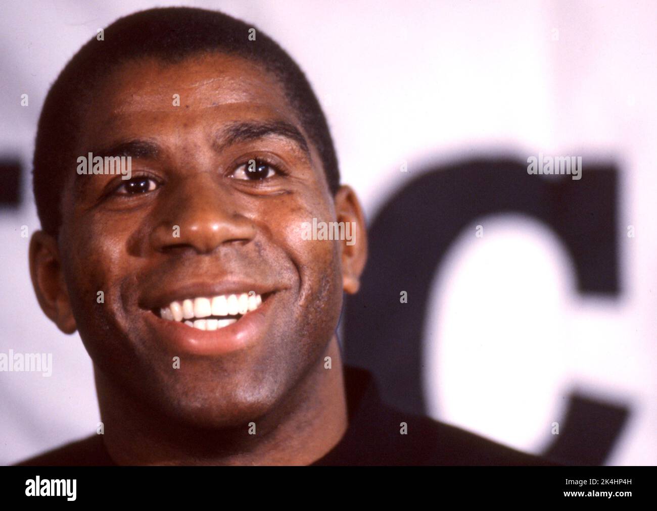 NBA superstar Ervin 'Magic' Johnson is shown at a press conference in Chicago Illinois shortly after announcing that he had contracted AIDS in 1991. Stock Photo