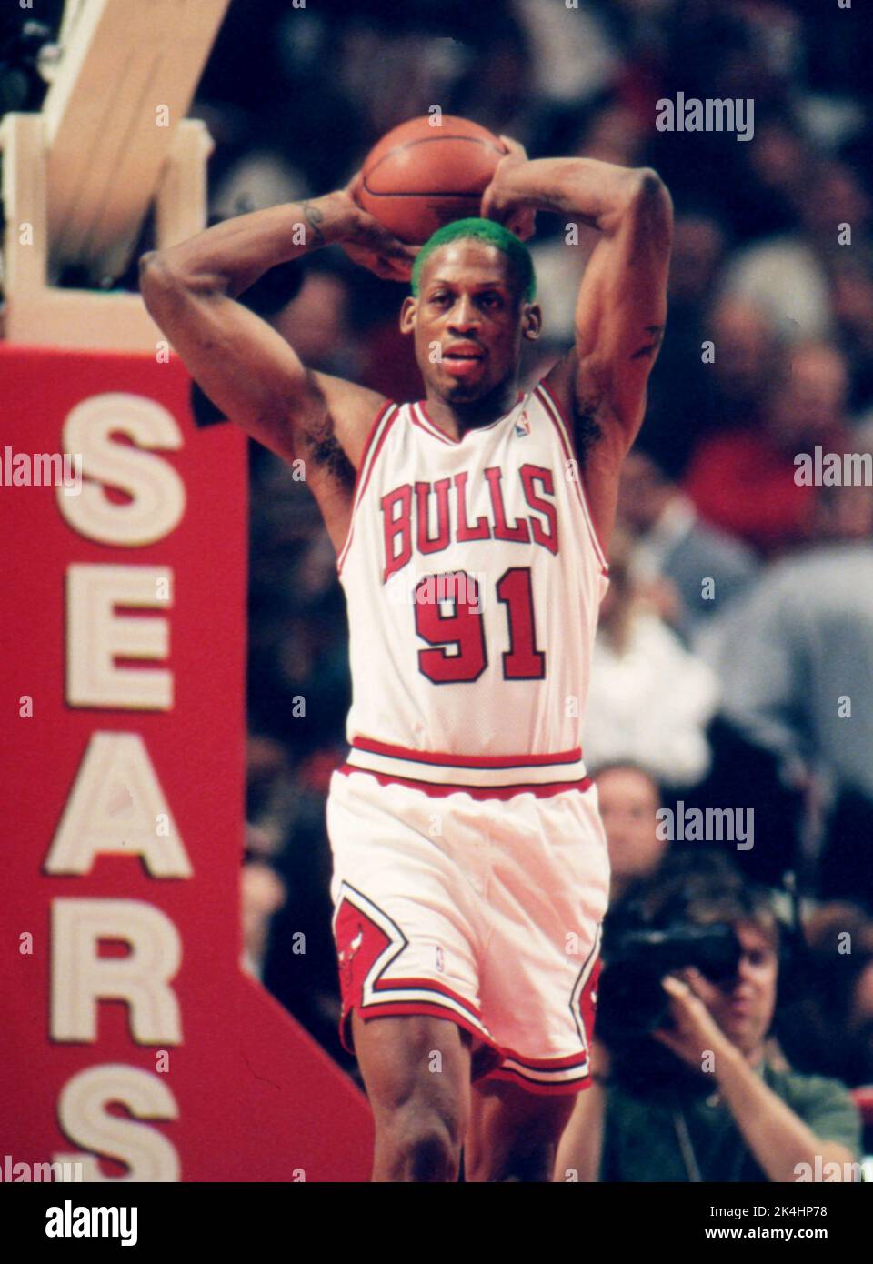 Dennis Rodman of the Chicago Bulls in shown during game action, ca. 1995 Stock Photo Alamy