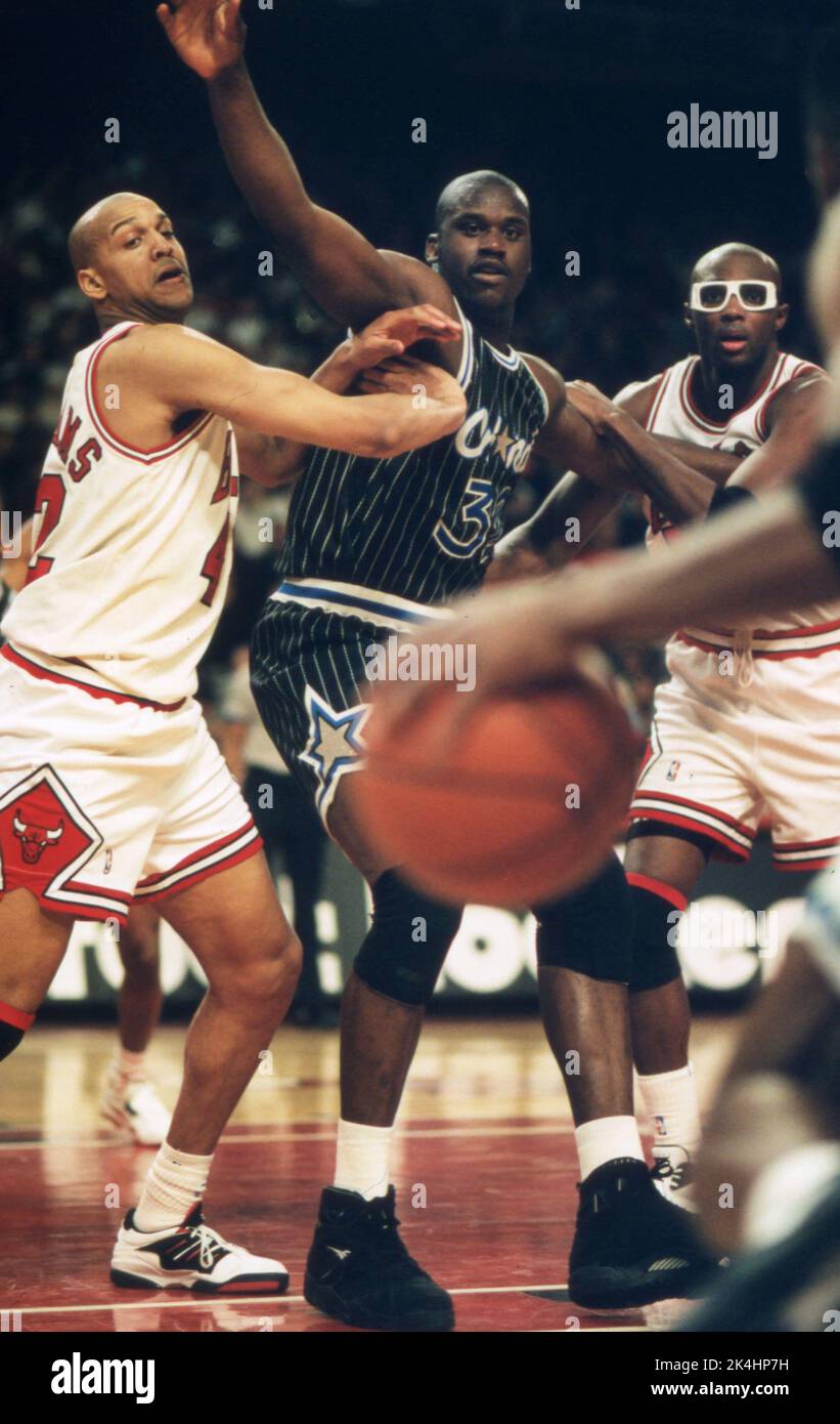 Shaquille O'Neal of the Orlando Magic battles for position in a game against the Chicago Bulls ca. 1993. Stock Photo