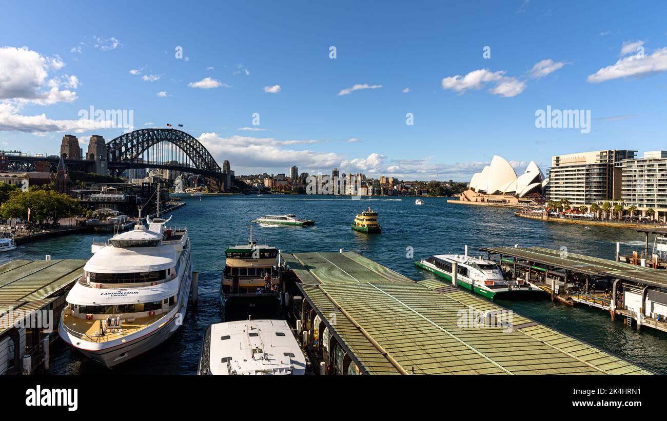 A panoramic view of ferries approaching the Circular Quay Ferry Wharf Stock Photo