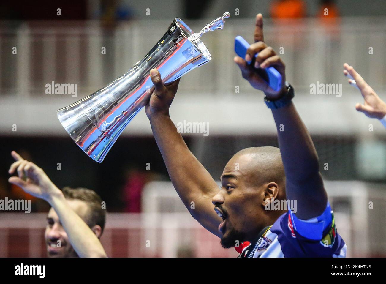 Buenos Aires, Argentina. 02nd Oct, 2022. Ernani Ricardo de Oliveira of Cascavel (BRA) seen with trophy during the award ceremony of Libertadores Futsal 2022 at Befol Arena in Buenos Aires. Credit: SOPA Images Limited/Alamy Live News Stock Photo