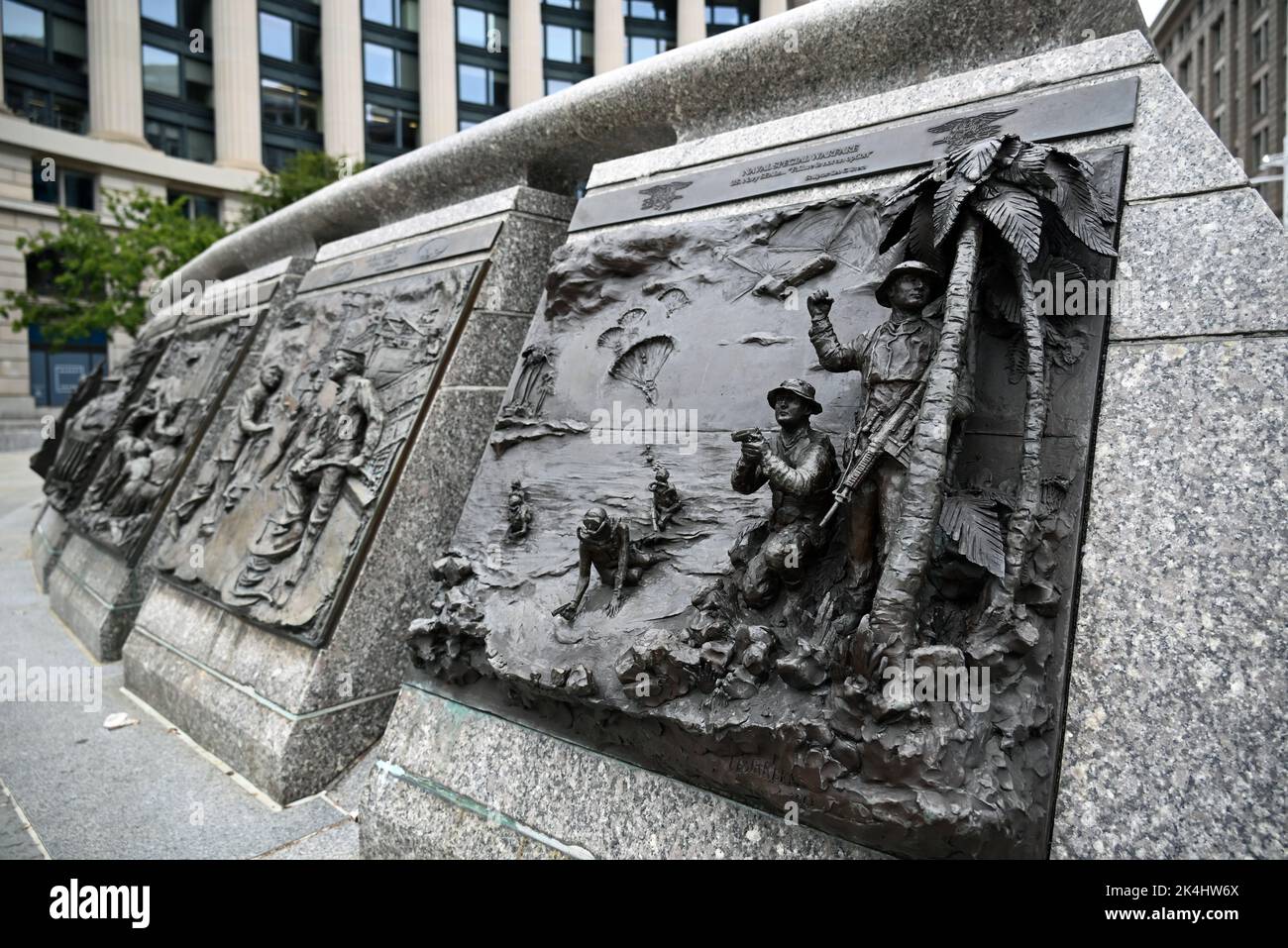Relief panel depicting Navy Seals special operations forces at the US Navy Memorial located next to the Navy Heritage Center in Washington, DC. Stock Photo
