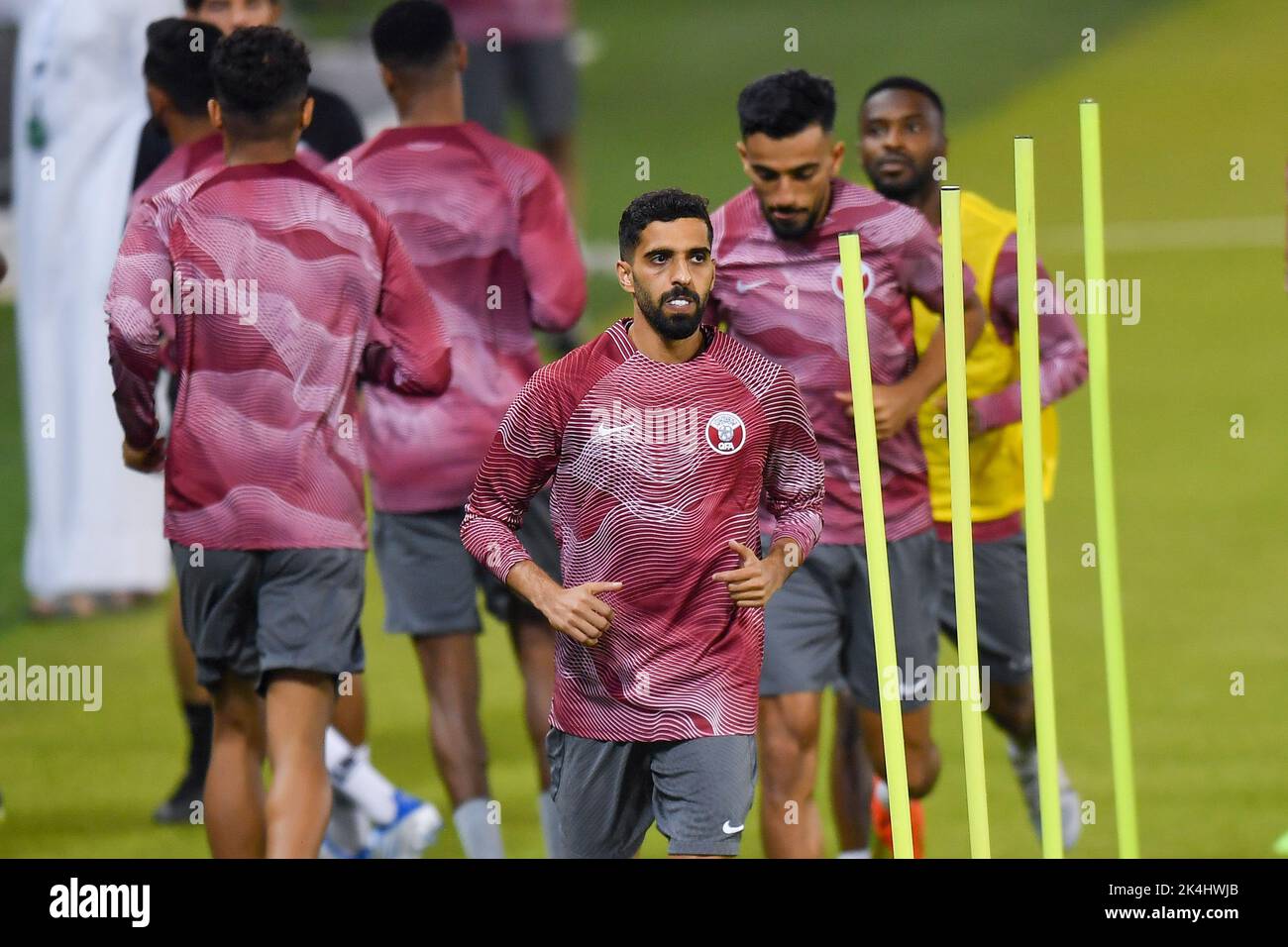 Doha, Qatar. 2nd Oct, 2022. Hassan Al Haydos of Qatar (front) attends a