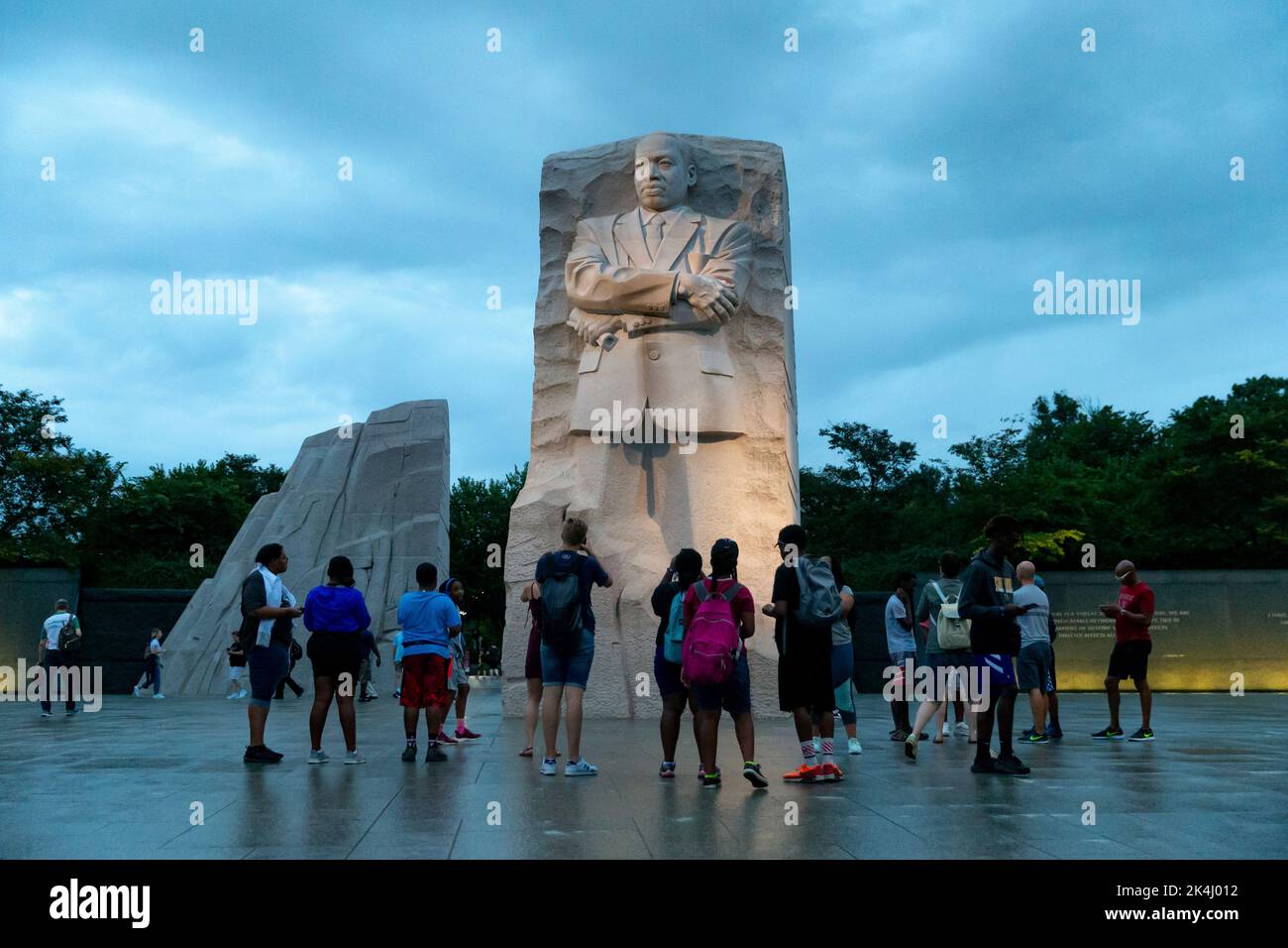 The Martin Luther King, Jr. Memorial is a national memorial located in West Potomac Park next to the National Mall in Washington, D.C., United States. It covers four acres  and includes the Stone of Hope, a granite statue of Civil Rights Movement leader Martin Luther King Jr. carved by sculptor Lei Yixin. The inspiration for the memorial design is a line from King's 'I Have a Dream' speech: 'Out of the mountain of despair, a stone of hope.' The memorial opened to the public on August 22, 2011, after more than two decades of planning, fund-raising, and construction. Stock Photo