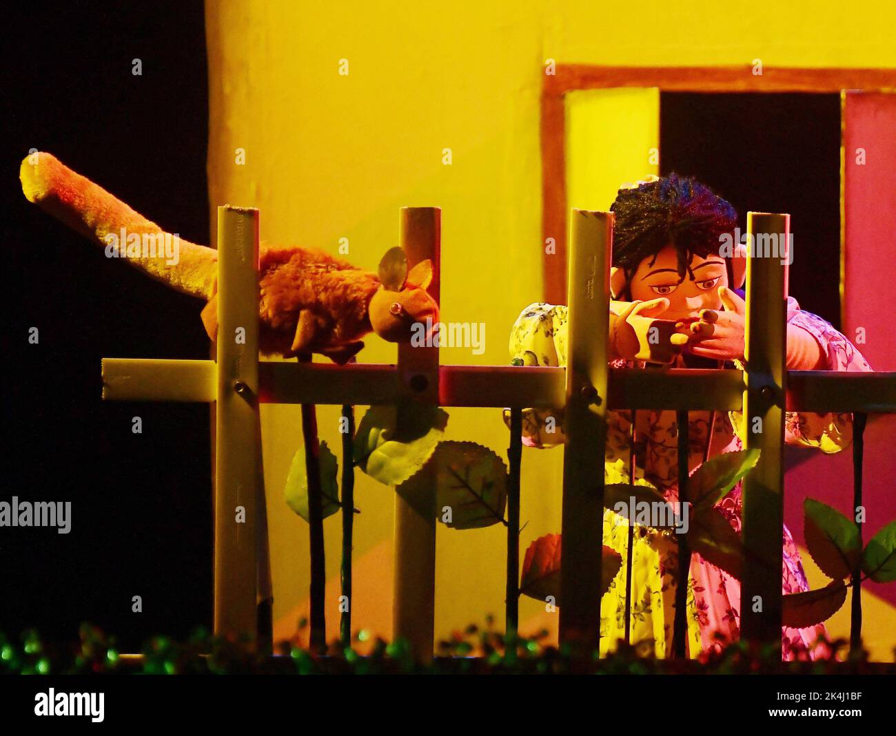 Puppeteers of the Tripura Puppet Theatre perform during a puppet show