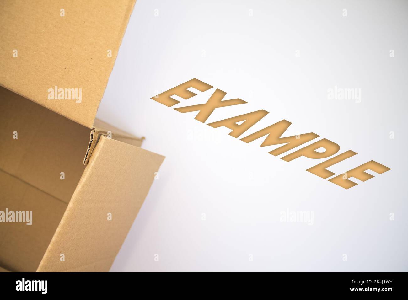 Example word with cardboard box. Brown folded card box Stock Photo Alamy