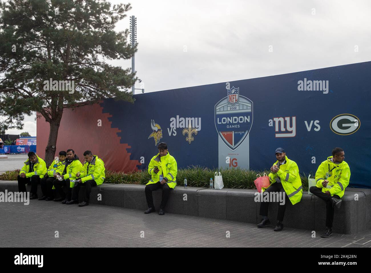 Police officers have a break before the Minnesota Vikings vs New Orleans Saints NFL Game on Sun Oct. 2, 2022 at Tottenham Hotspurs Stadium in London, Stock Photo