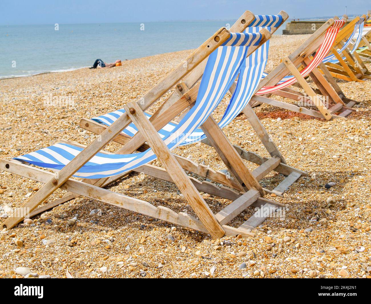 Striped deck chairs on Brighton Beach Stock Photo Alamy