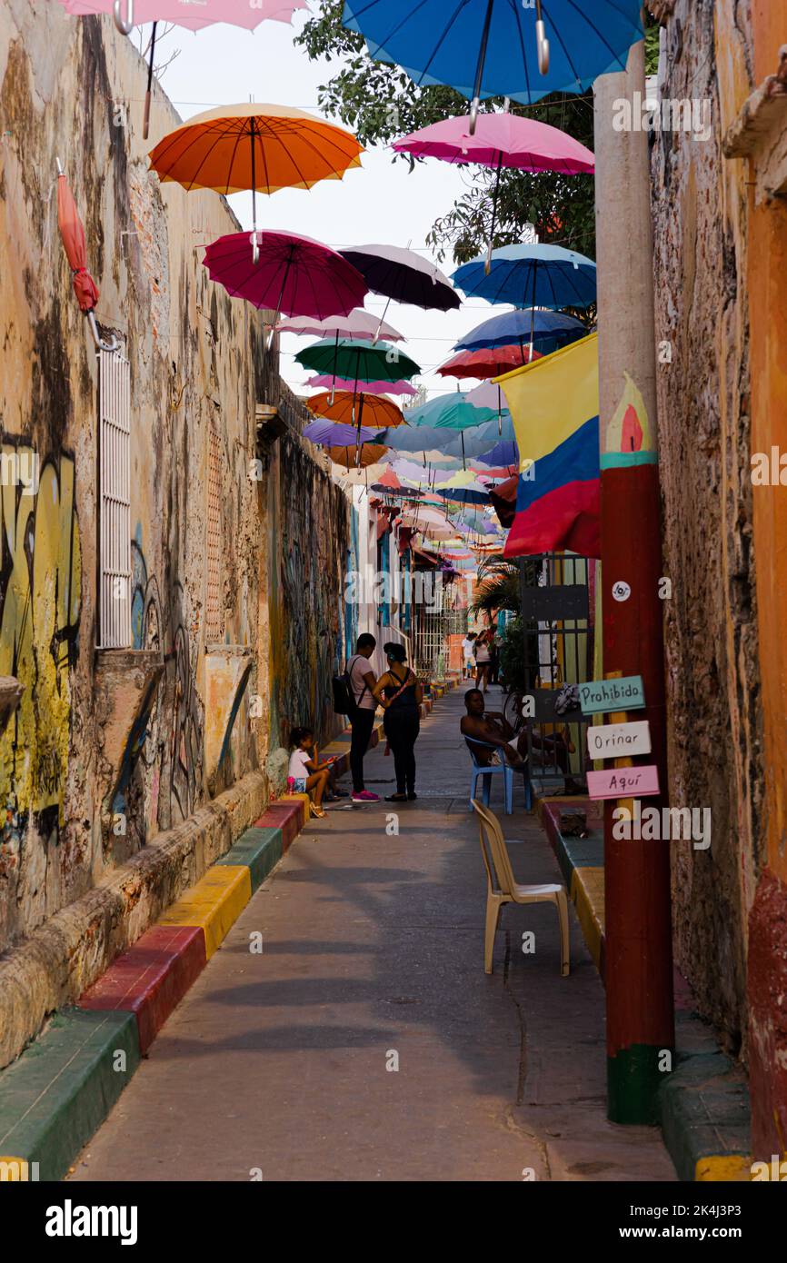 Cartagena, Bolívar, May 5, 2019: An alley with hanging umbrellas in Cartegena Stock Photo