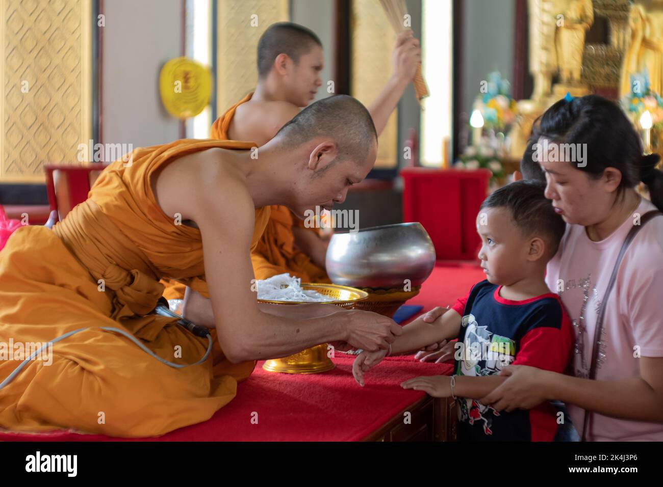 Lam Sai Subdistrict, Pathum Thani Province, December 31, 2018: Buddahist monks performing ritual. Stock Photo