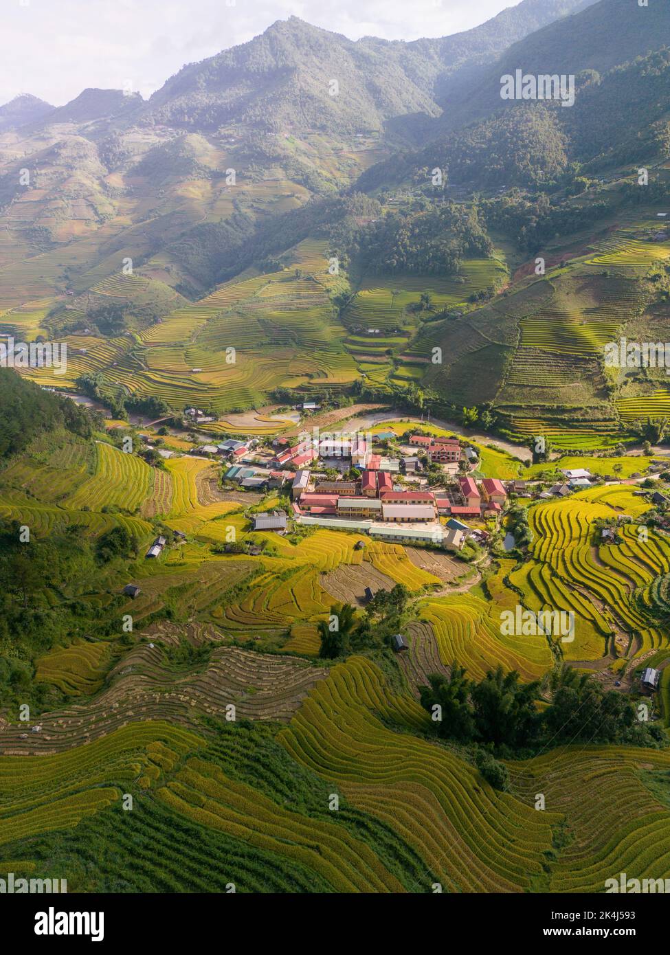 Aerial view of golden rice terraces at Mu cang chai town near Sapa city ...