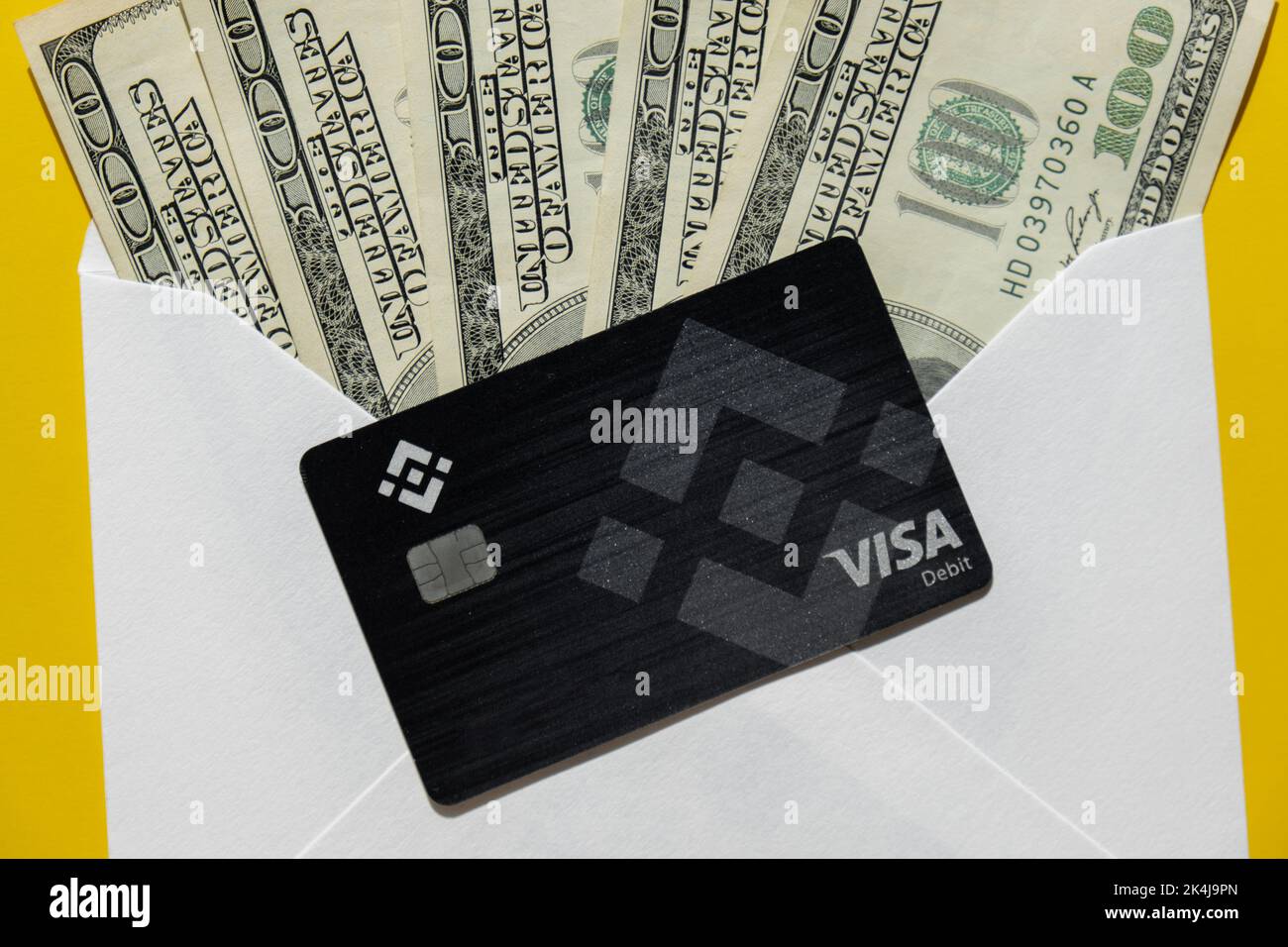 Gdansk Poland - 20 June 2022: Black Binance Coin Card with dollars. Visa  debit card BNB, Binance Exchange Cryptocurrency Card to buy bitcoin. Crypto  exchange during the market crash. Blockchain cryptocurrency payment