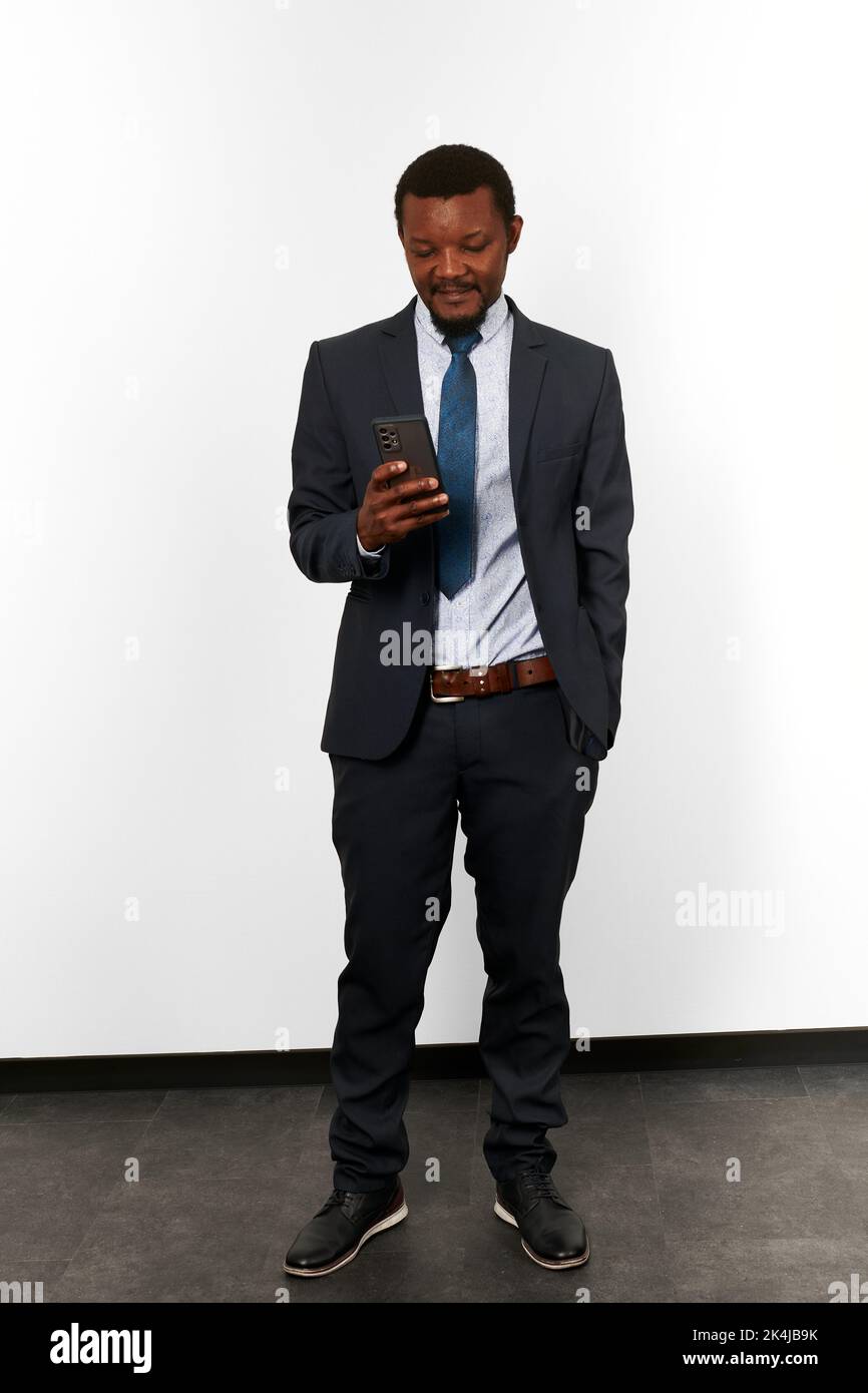 Smiling african american black man in business suit looking in ...