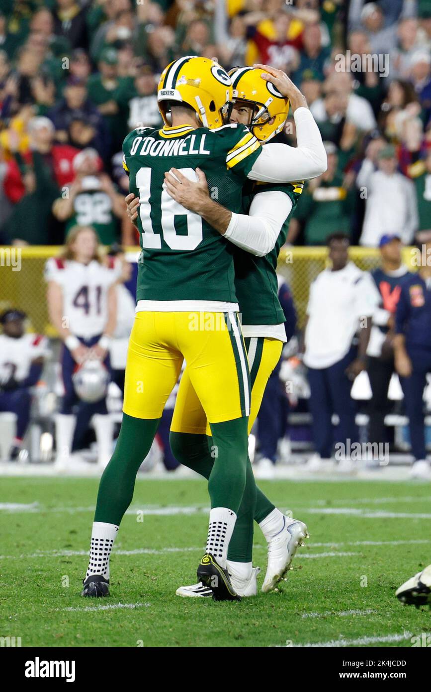 Green Bay Packers place kicker Mason Crosby (2) greets his