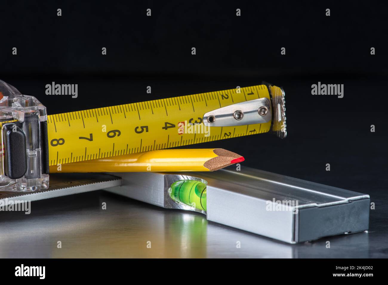Measuring tape and metal corner close-up Stock Photo
