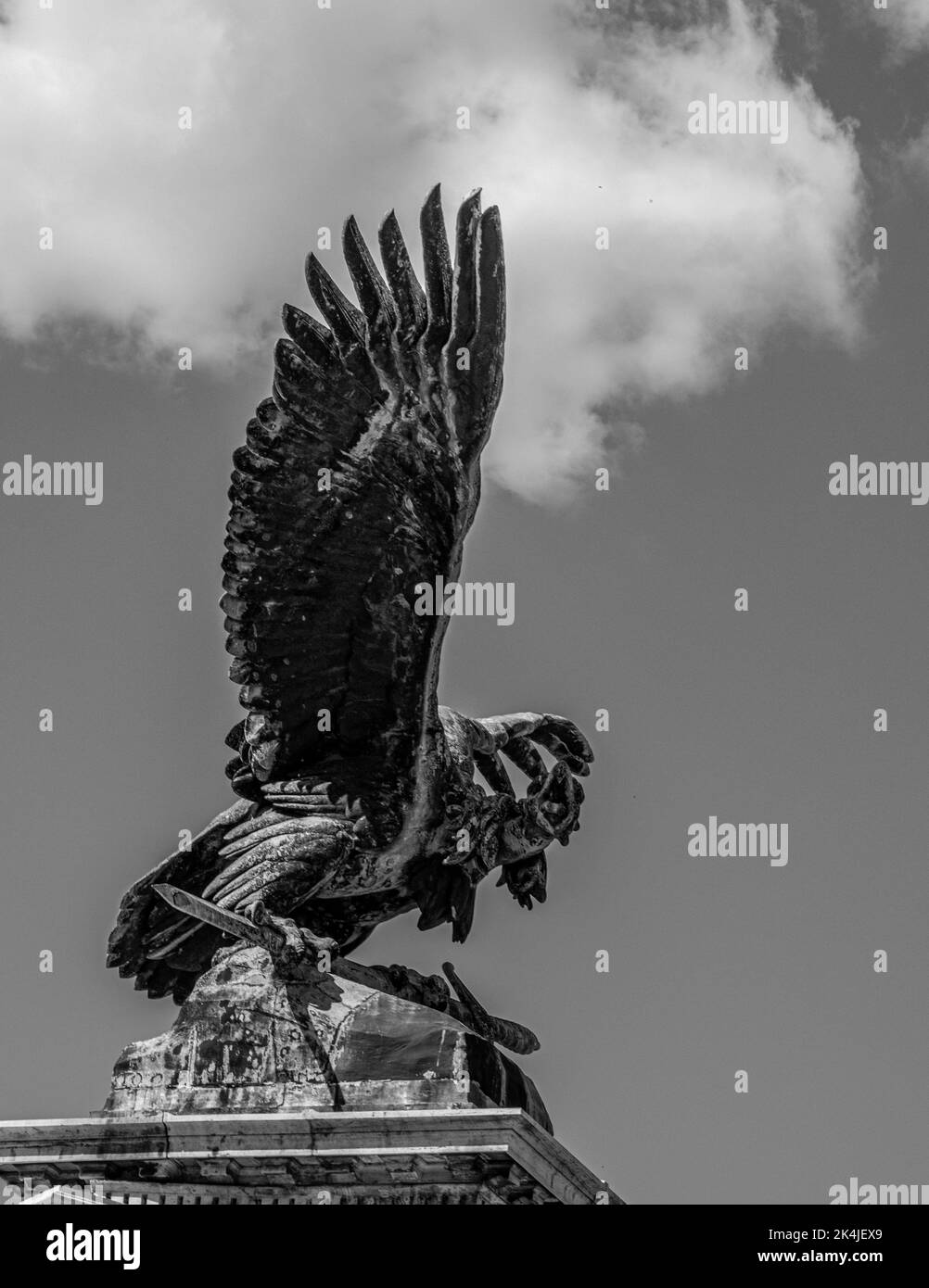 A vertical grayscale of Turul Bird Statue in Budapest, Hungary Stock Photo Alamy