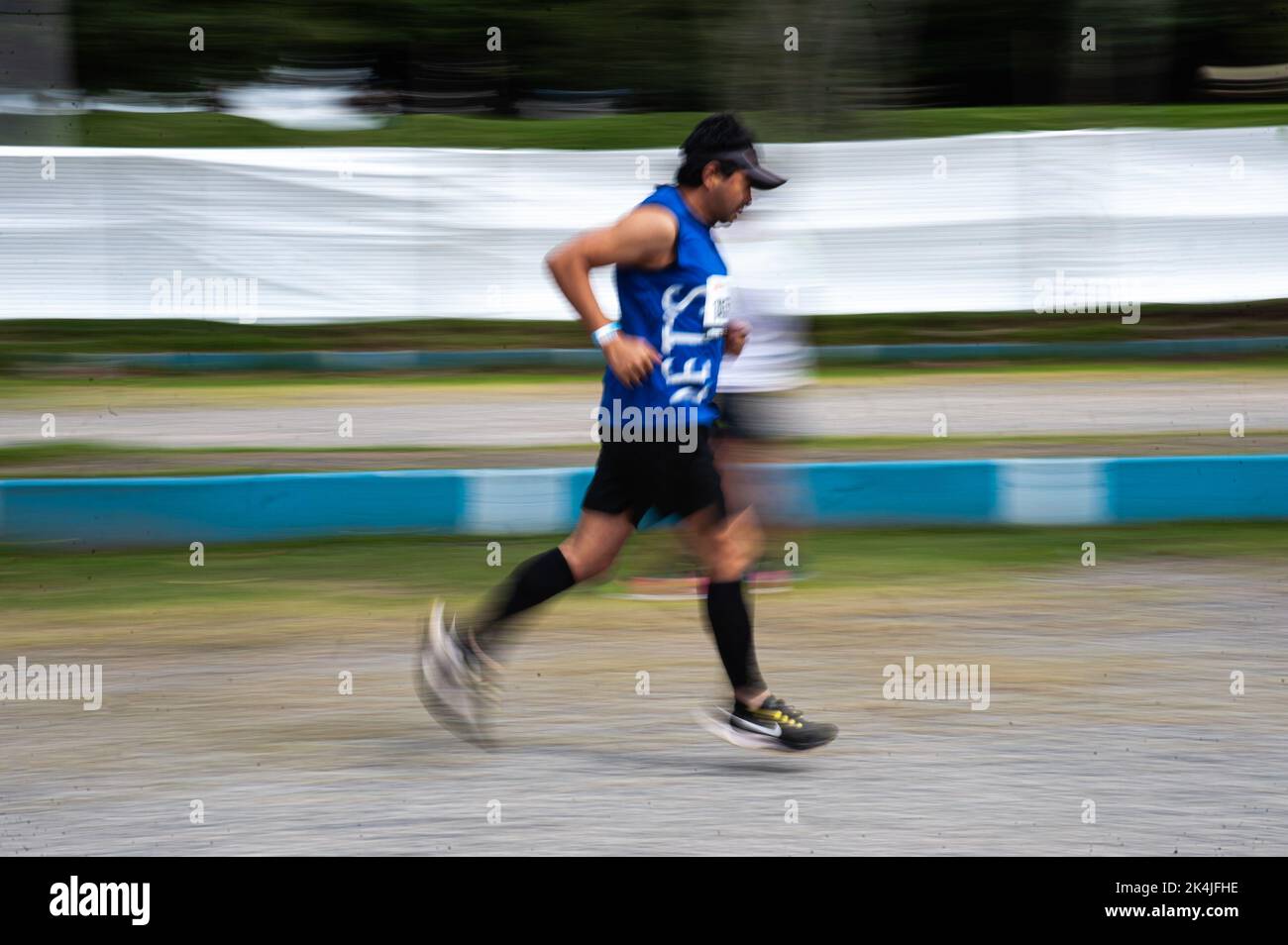 An athlete warmsup during the comeback after two years of Bogota's