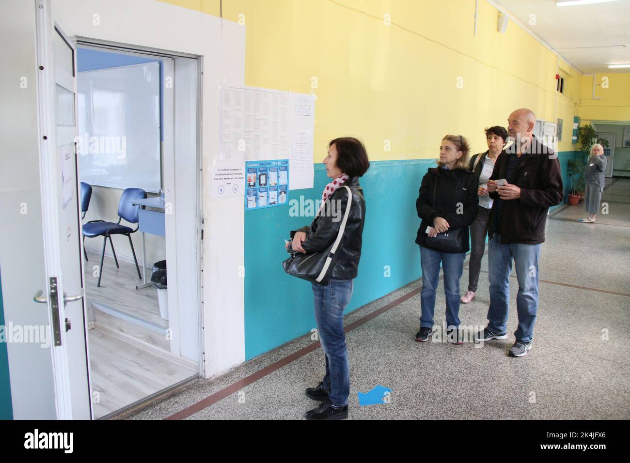 Sofia, Bulgaria. 2nd Oct, 2022. People wait to vote during the early parliamentary elections at a polling station in Sofia, Bulgaria, Oct. 2, 2022. TO GO WITH 'GERB-UDF coalition leads in Bulgaria's parliamentary elections: exit polls' Credit: Marian Draganov/Xinhua/Alamy Live News Stock Photo
