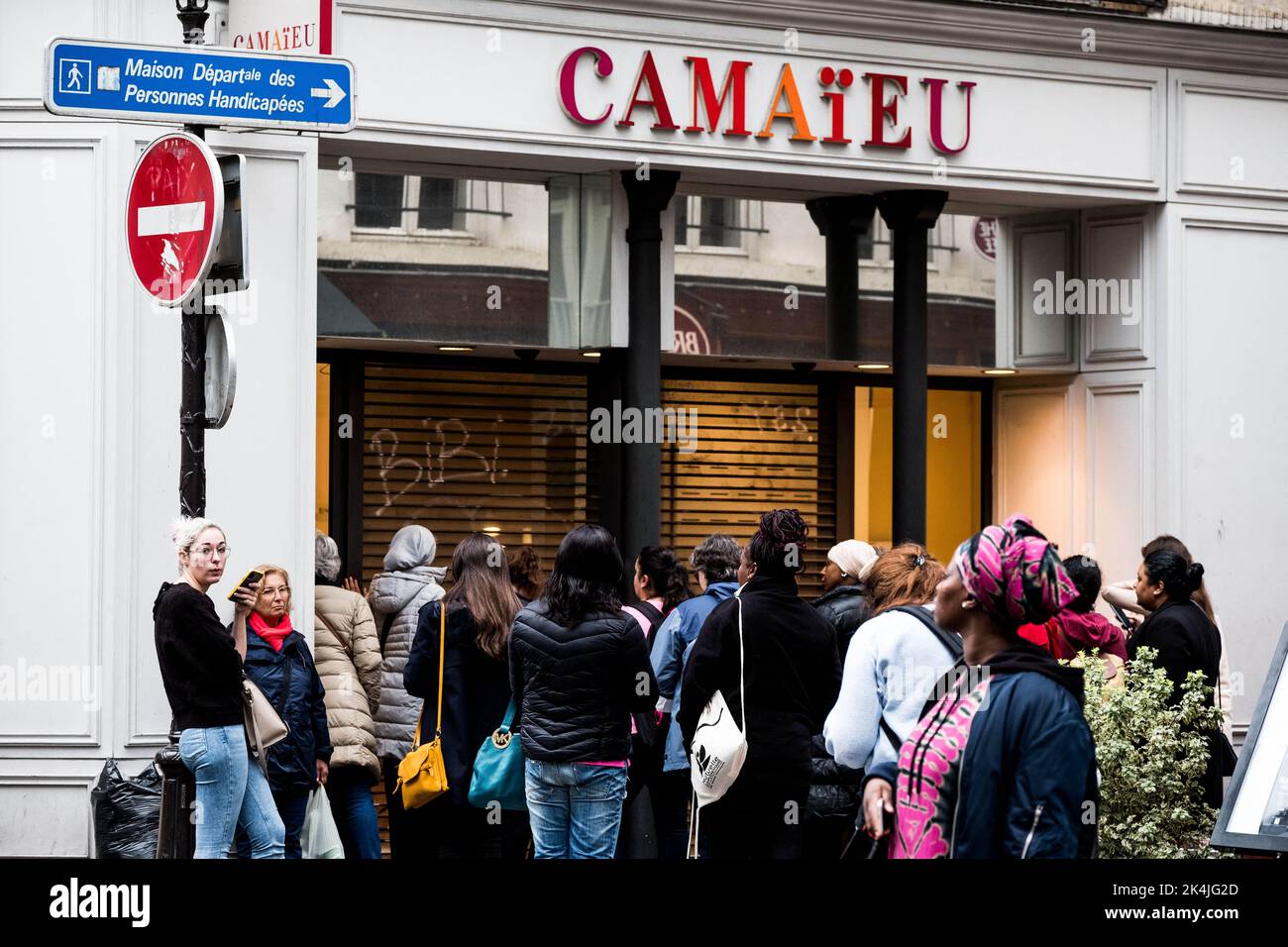 Customers take the line outside a Camaieu store on October 1, 2022 in  Paris, France. French fashion chain Camaïeu has been declared bankrupt  after a long agony. The chain goes into judicial