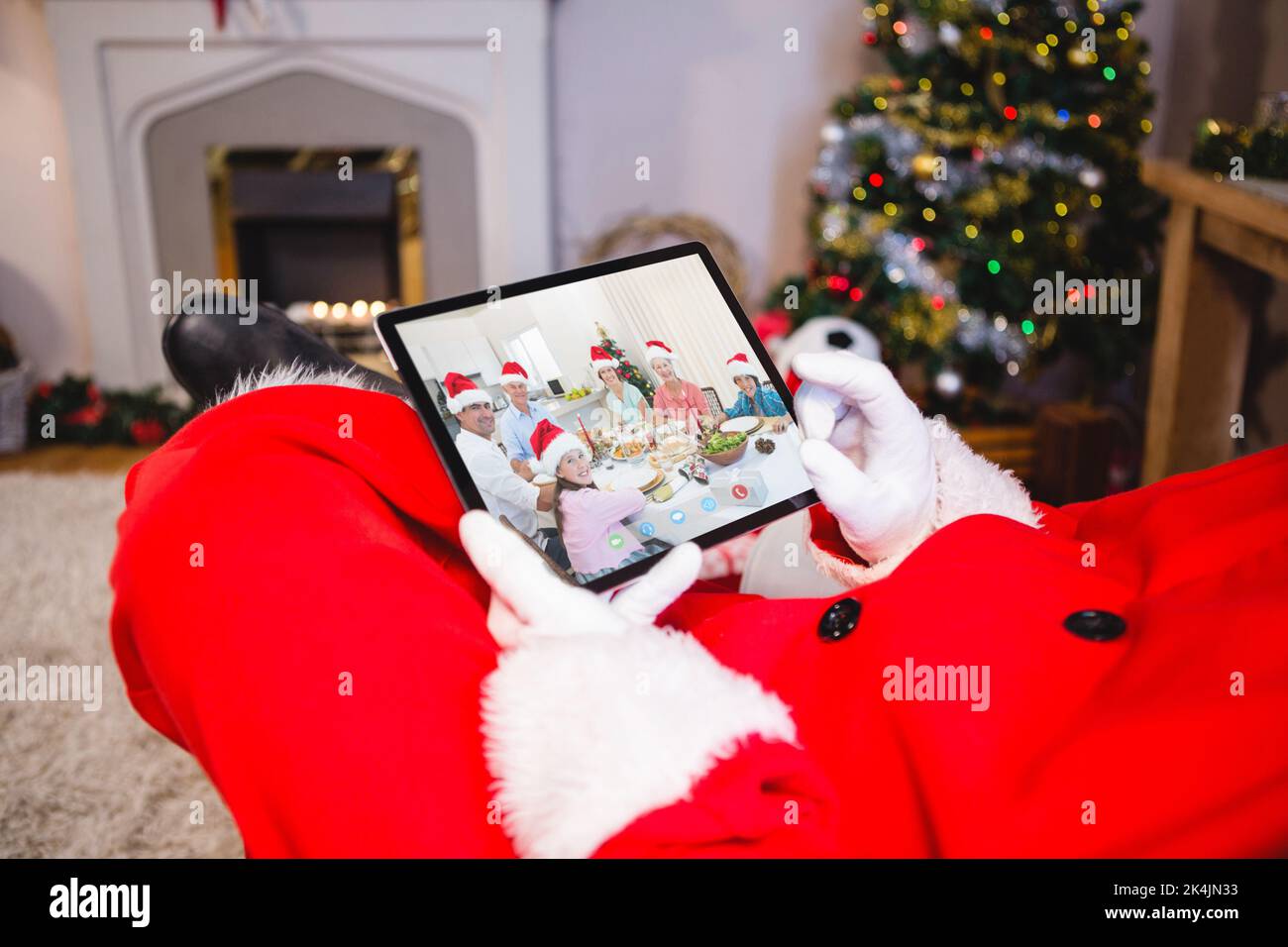 Santa Using Technology Image Santa claus making laptop christmas video call with smiling caucasian ...