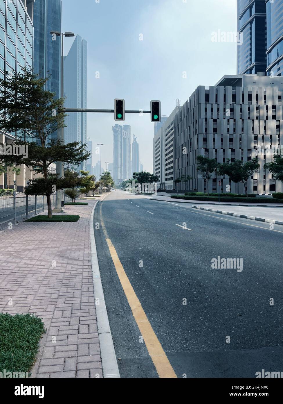 View on a megalopolis with skyscrapers and empty road Stock Photo