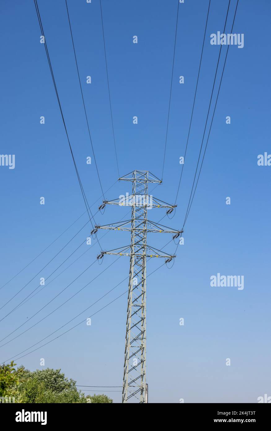 high voltage power pole and lines against the blue sky Stock Photo - Alamy