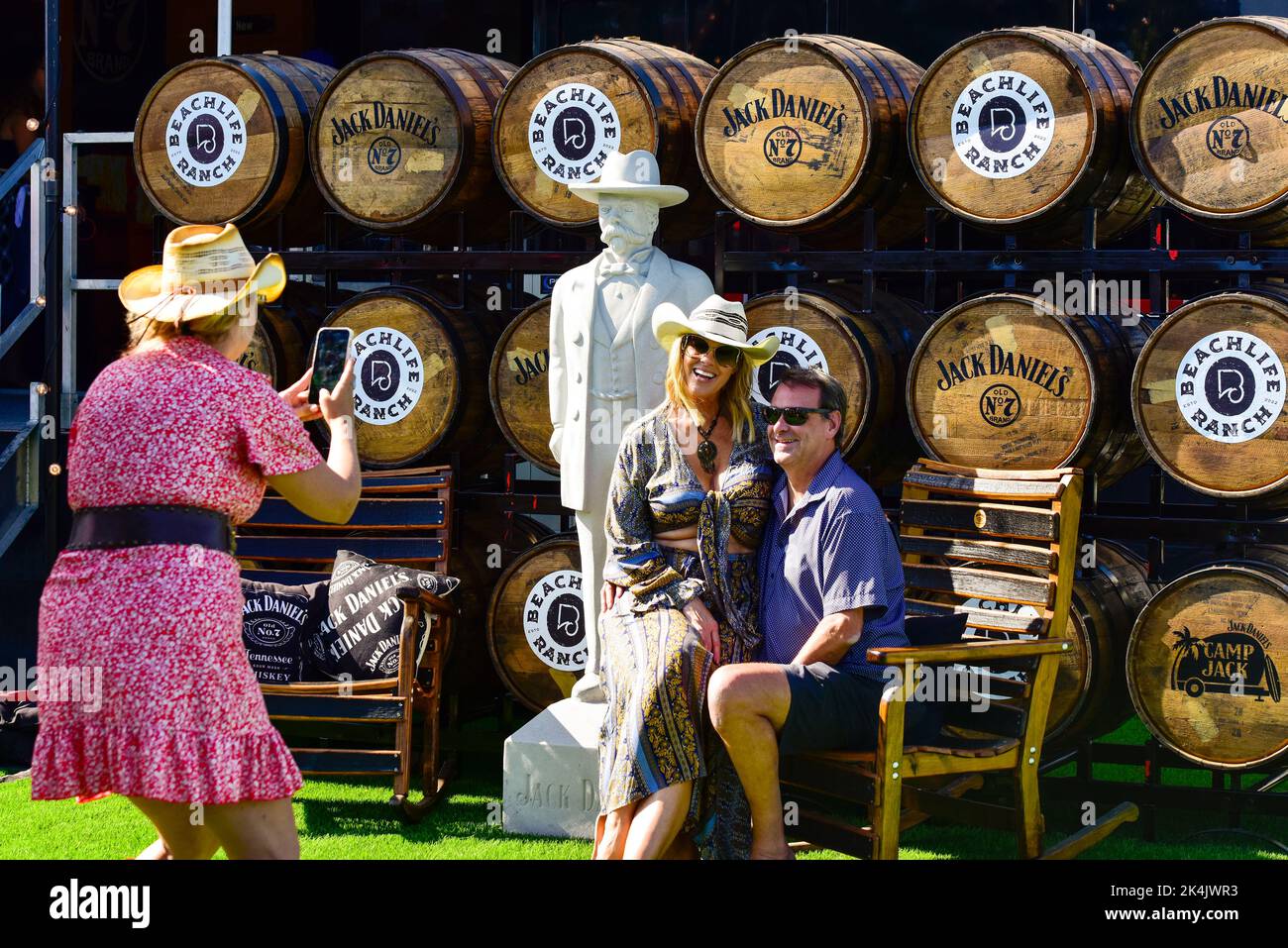 Redondo Beach, California September 17, 2022 - Festival goers taking pictures at the Jack Daniels vendor display at BeachLife Ranch Festival Stock Photo