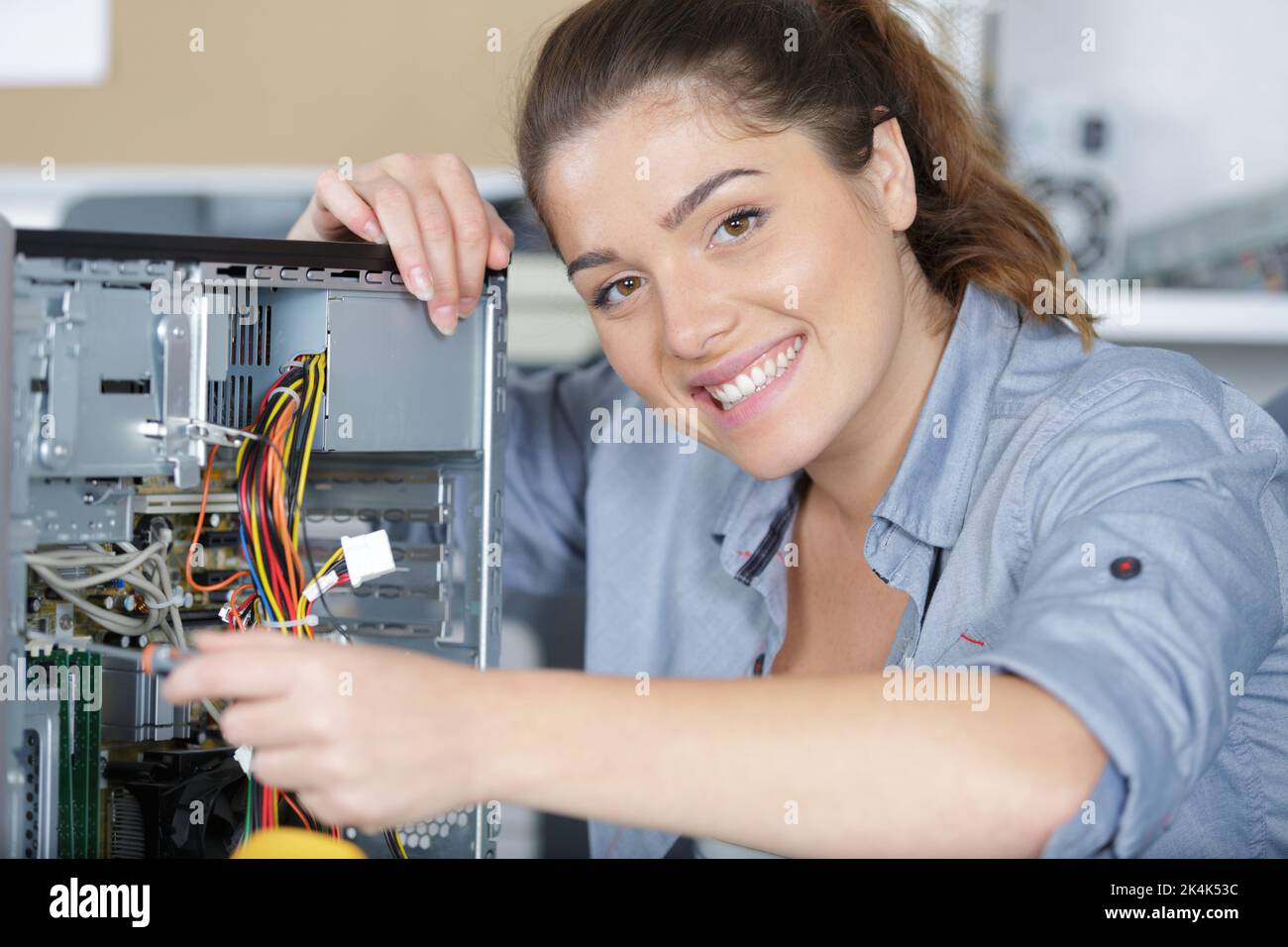 woman working in a pc store Stock Photo