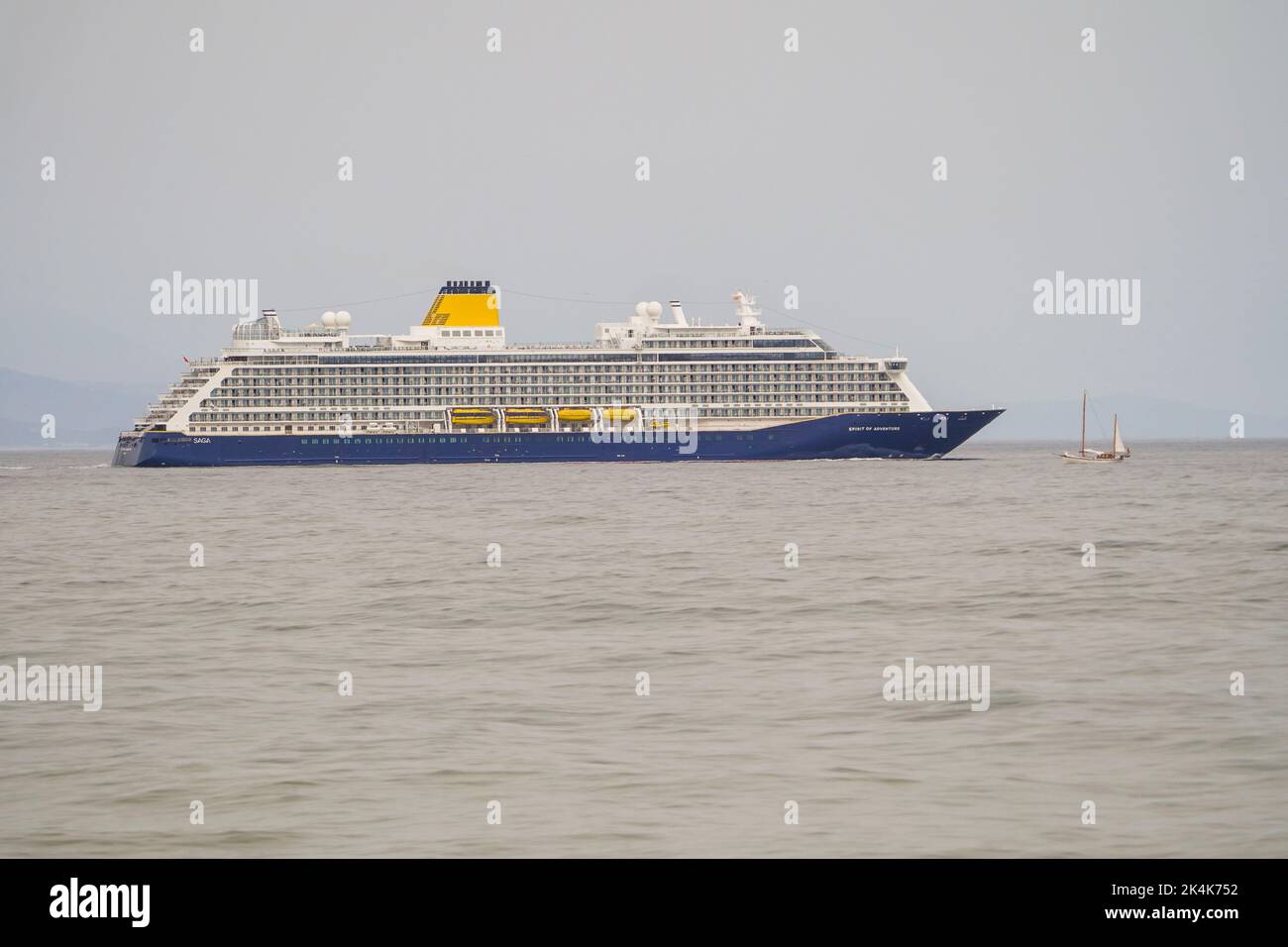 Spirit of Adventure, cruise ship operated by Saga, crossing a small