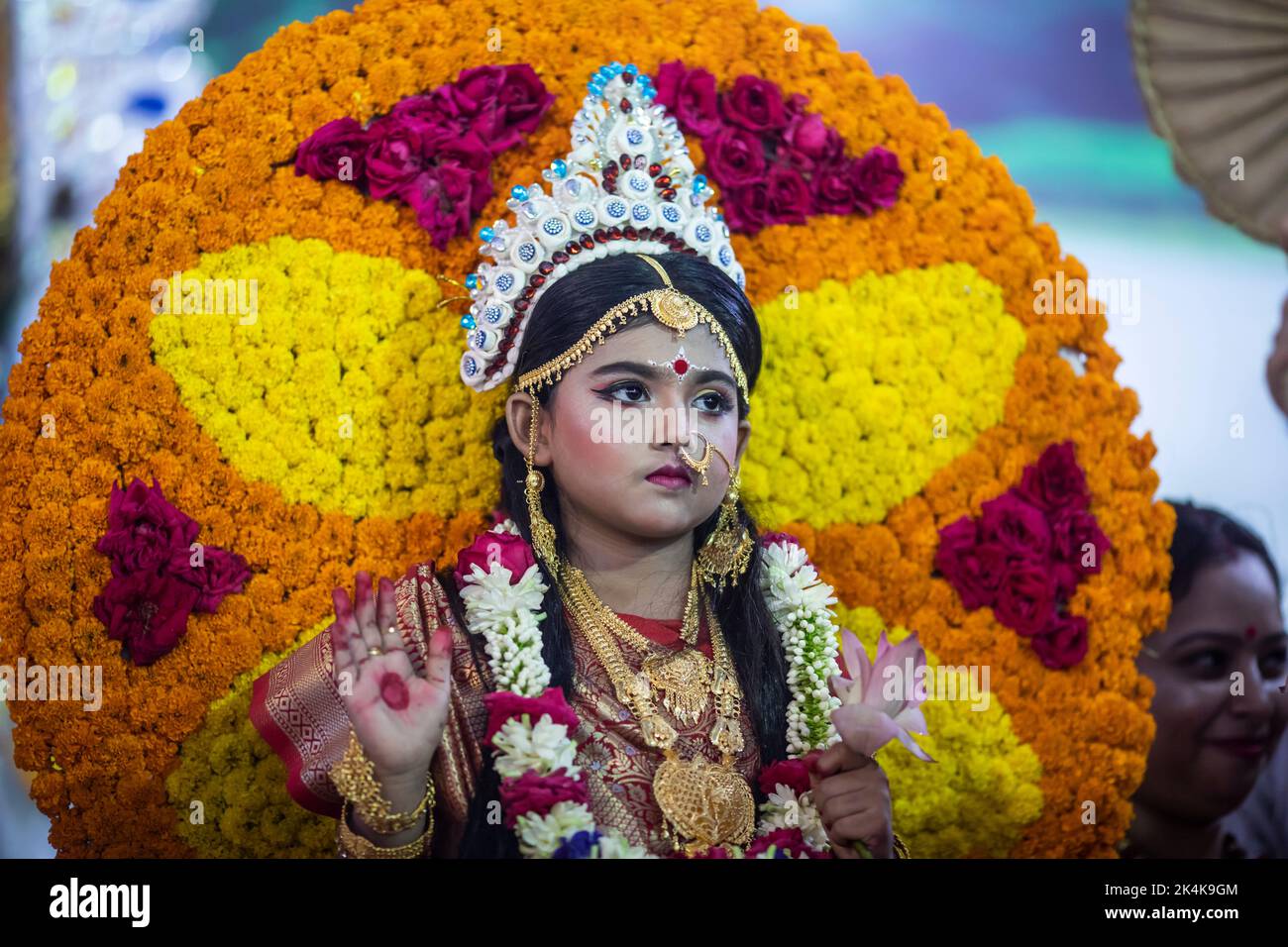Dhaka, Bangladesh. 03rd Oct, 2022. A kid dressed as living goddess 'Kumari' during the cultural and traditional Kumari Puja at the Ramkrishna Mission in Dhaka. Devotees pray before the living icon of a child Durga for the destruction of evil and the advent of auspicious forces. The Hindu community in Dhaka celebrated Kumari Puja after a two-year break due to the Covid-19 pandemic. Credit: SOPA Images Limited/Alamy Live News Stock Photo
