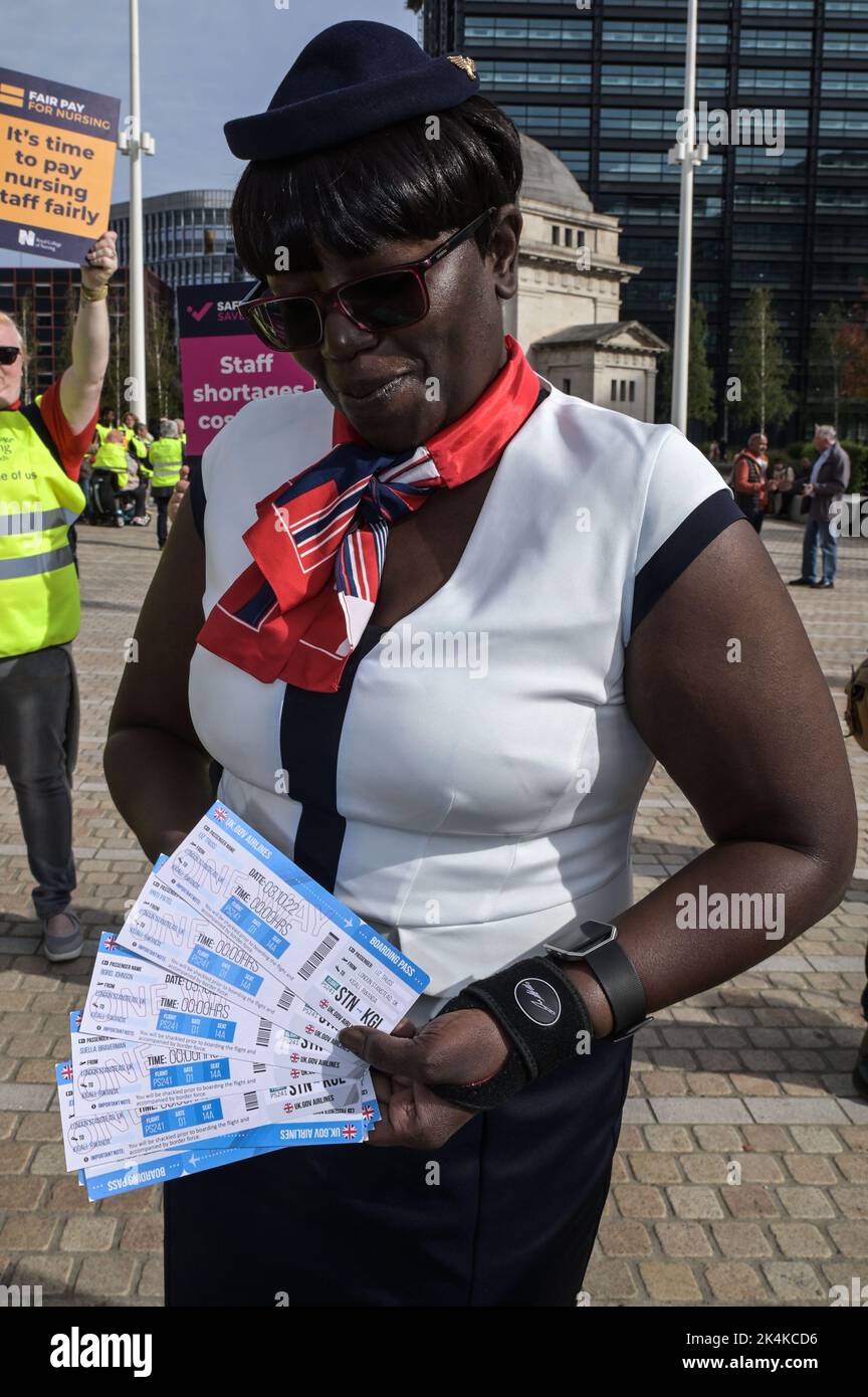 Centenary Square, Birmingham - October 3rd 2022 - Protesters with one way tickets to Rwanda with Liz Truss, Priti Patel and Boris Johnson's name printed on at the Conservative Party Conference in Birmingham at the International Convention Centre and Centenary Square. Pic Credit: Scott CM/Alamy Live News Stock Photo