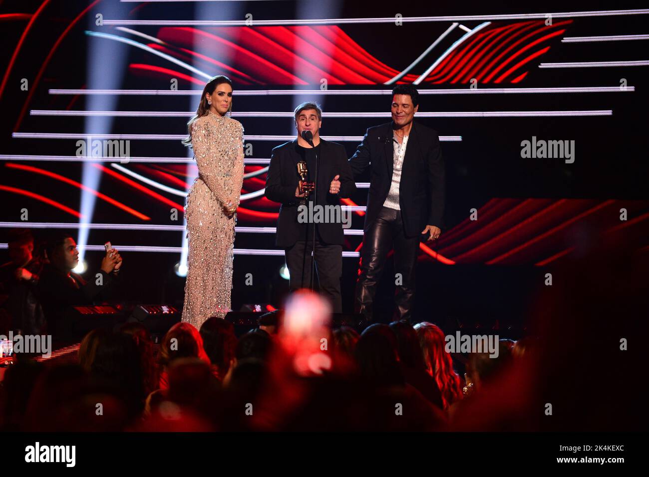 Coral Gables, USA. 29th Sep, 2022. CORAL GABLES, FLORIDA - SEPTEMBER 29: Ana Jurka, Afo Verde, Chairman and CEO for Sony Music Latin present Chayanne, the Billboard Icon Award onstage at the 2022 Billboard Latin Music Awards at Watsco Center on September 29, 2022 in Coral Gables, Florida. (Photo by JL/Sipa USA) Credit: Sipa USA/Alamy Live News Stock Photo