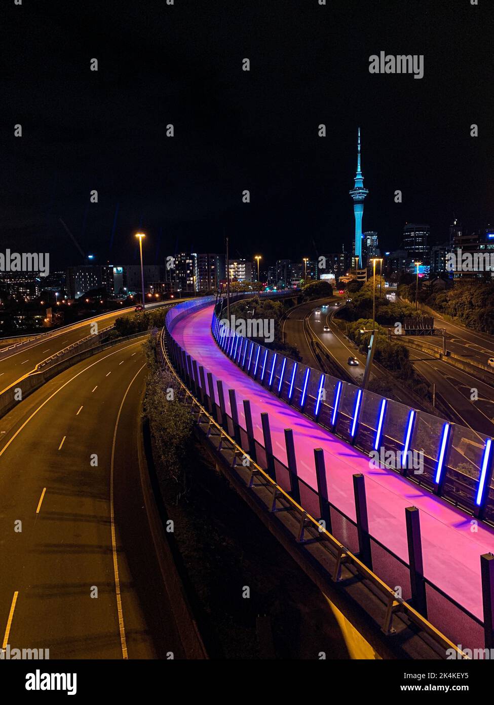 A vertical shot of a beautiful cityscape during dark night Stock Photo ...