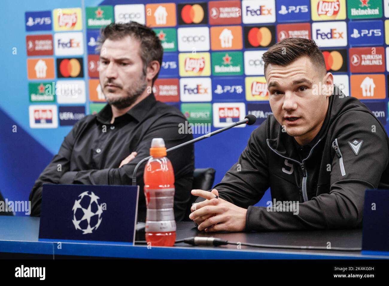 Club's head coach Carl Hoefkens and Club's Ferran Jutgla pictured during a press conference of Belgian soccer team Club Brugge KV, Monday 03 October 2022 in Brugge, in preparation of tomorrow's game against Spanish Atletico Madrid on day 3/6 of the UEFA Champions League group stage. BELGA PHOTO BRUNO FAHY Stock Photo
