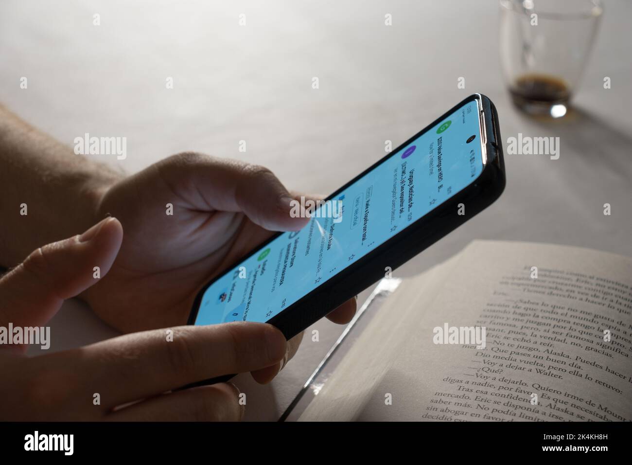 Caucasian man reading mail on his phone Stock Photo