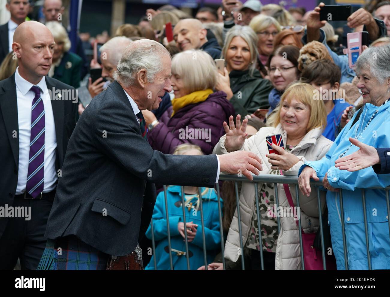King Charles III meets the public on a walk about after attending an