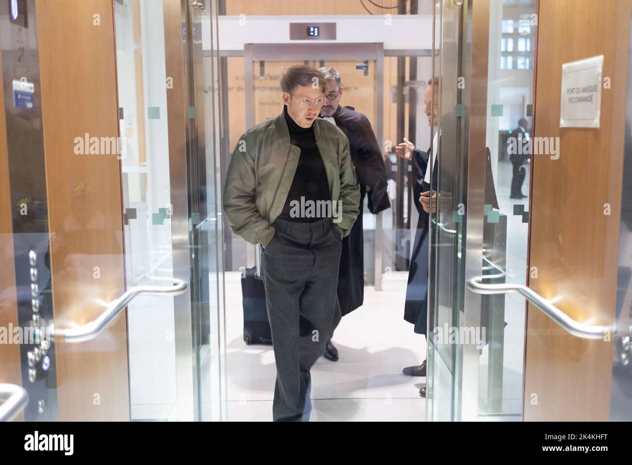 French singer Eddy de Pretto arrives for a trial where 17 people are ...